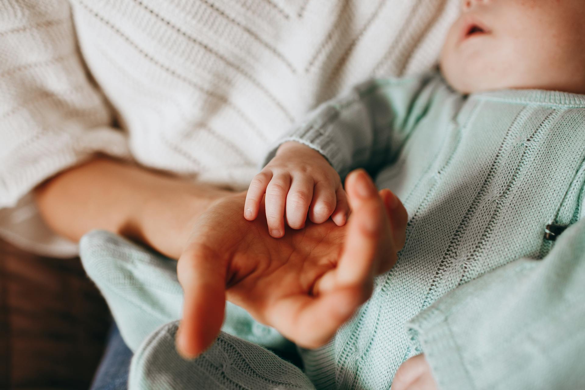 A person holding a baby | Source: Pexels