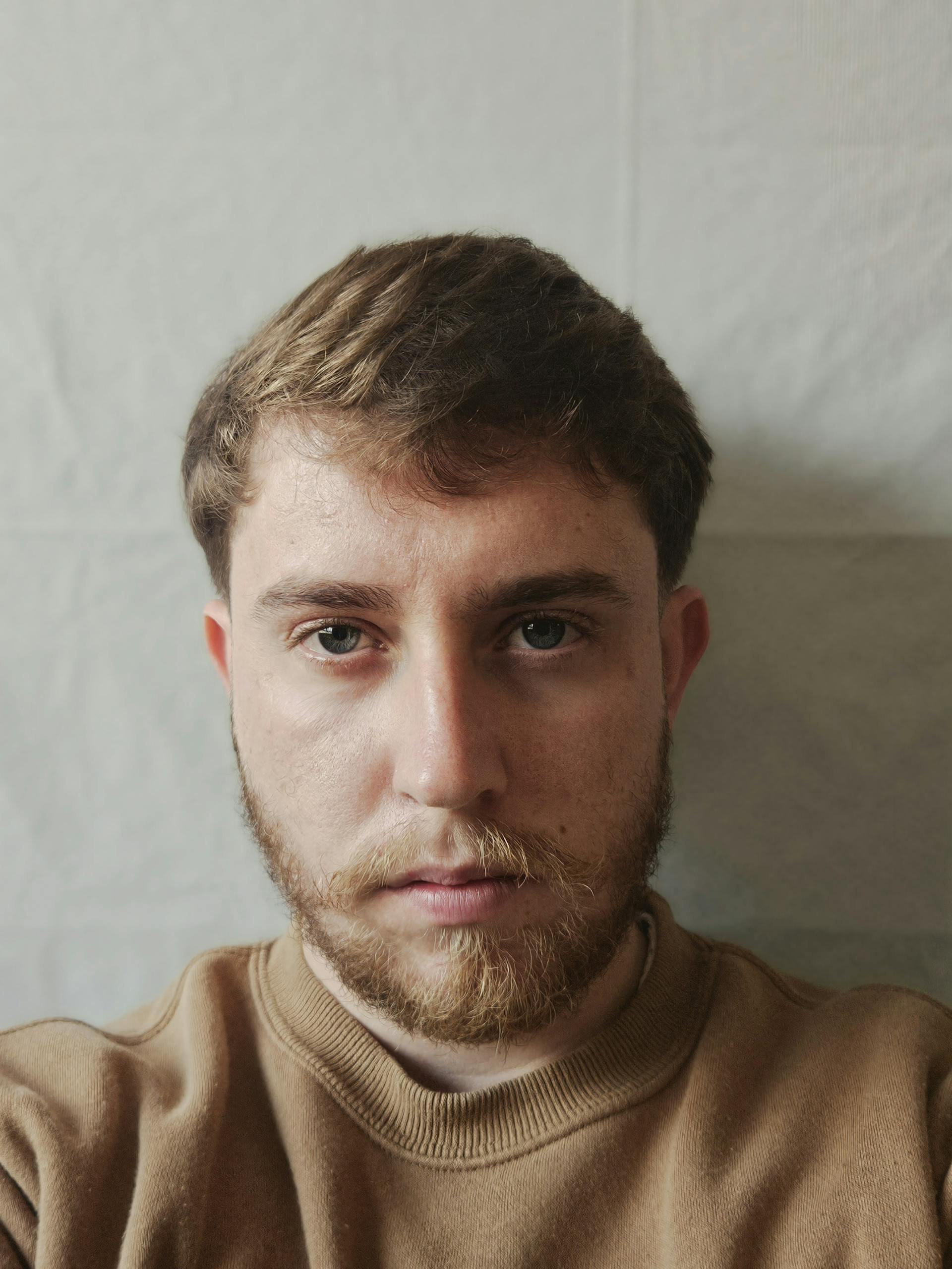 A teary-eyed man | Source: Pexels