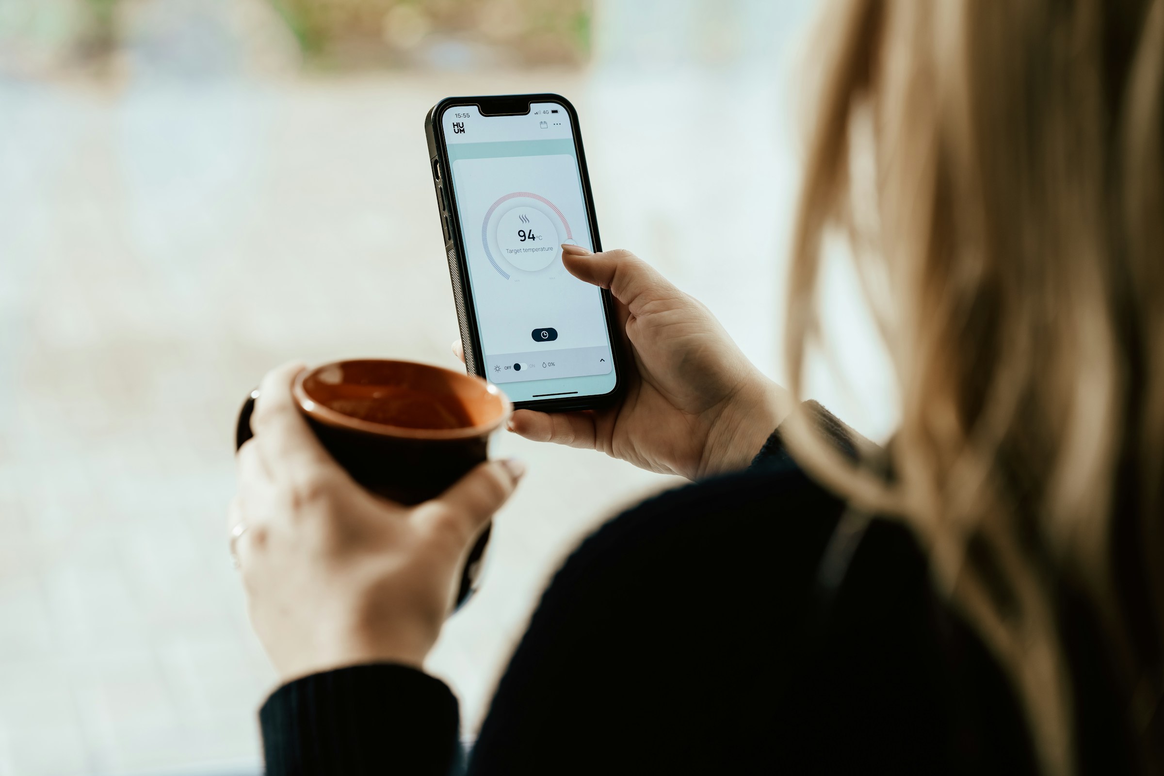 A woman using a phone | Source: Unsplash