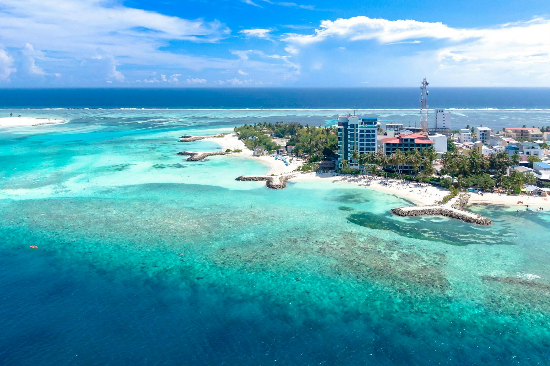 An aerial view of a tropical island and coastline | Source: Pexels