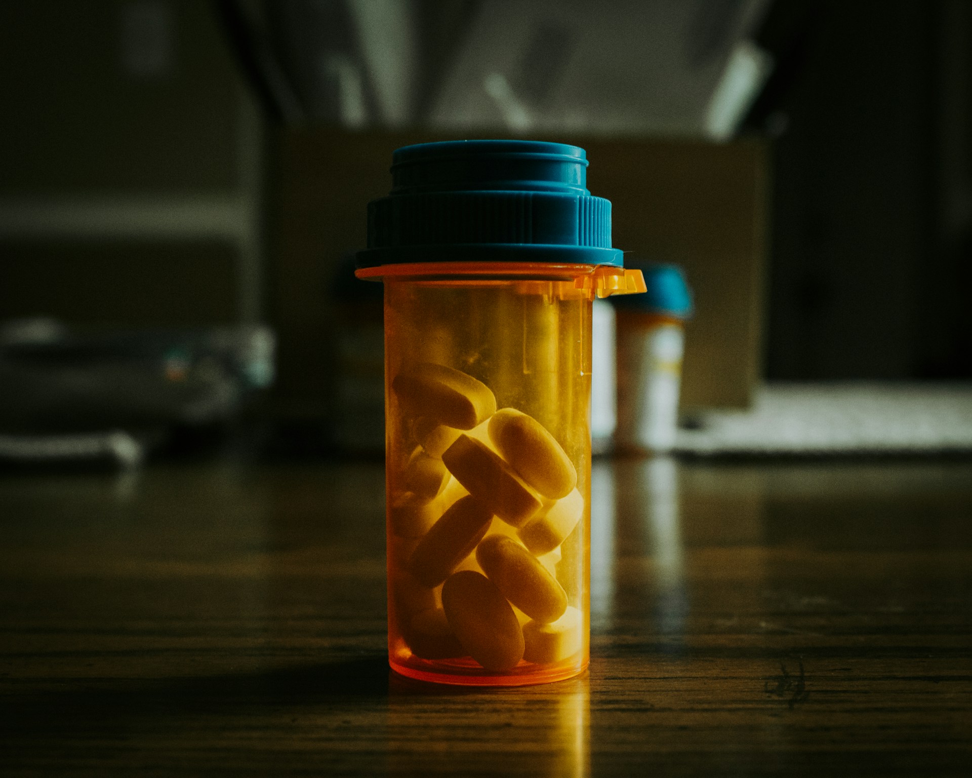 Pill bottles on a table | Source: Unsplash