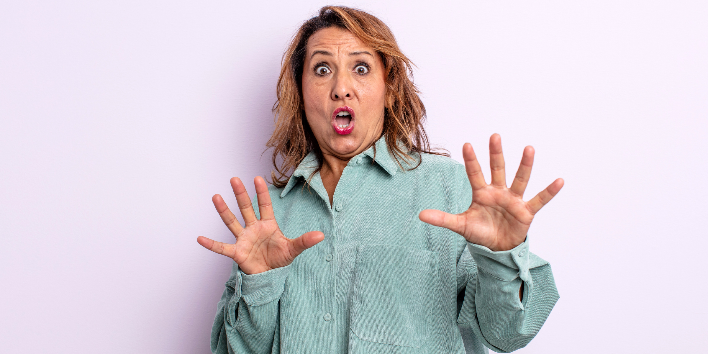 A woman staring at something in horror | Source: Shutterstock