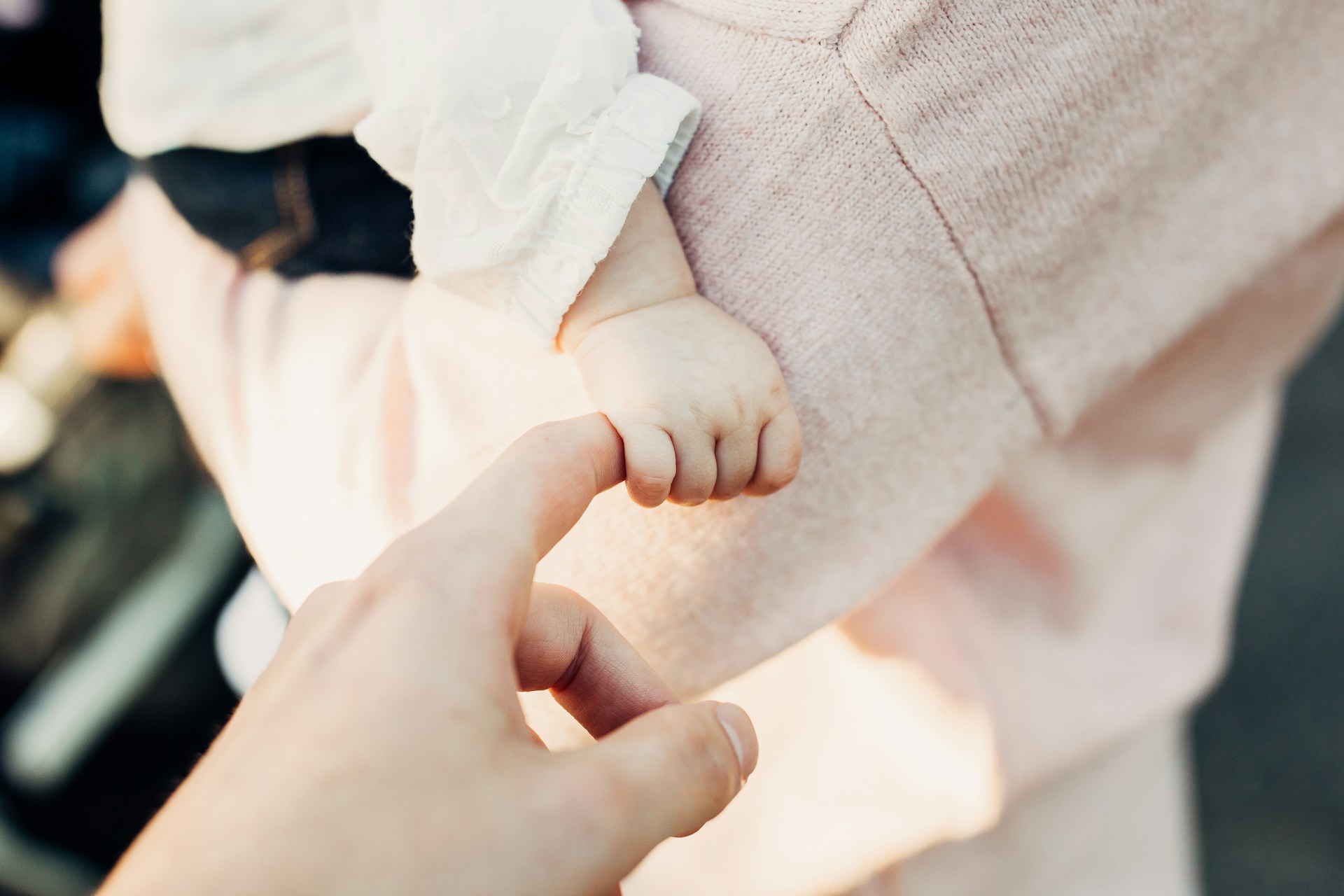 A couple with their baby | Source: Unsplash