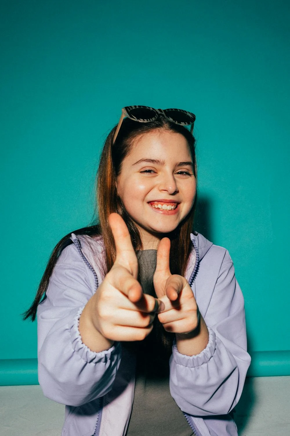 A smiling teenage girl | Source: Pexels