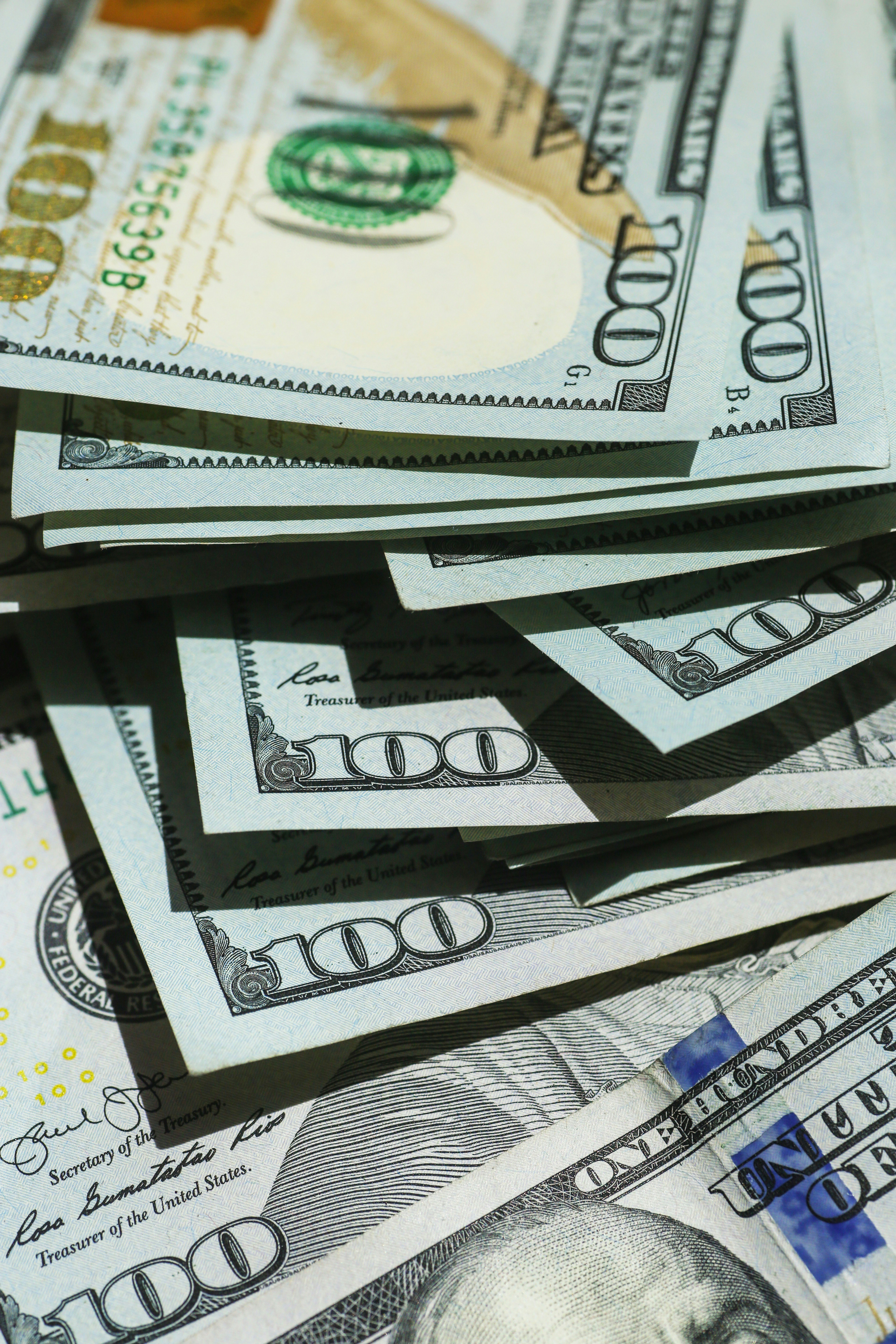 Stacks of money on a table | Source: Unsplash