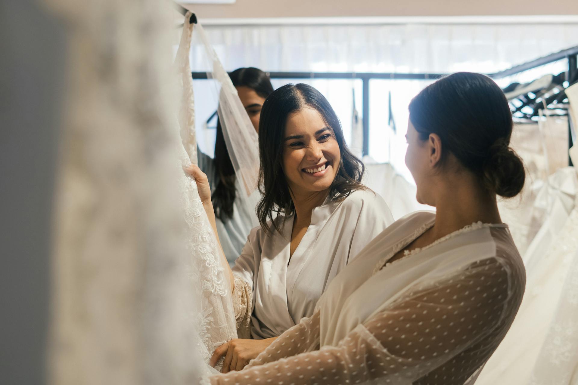 Two women smiling at each other | Source: Pexels