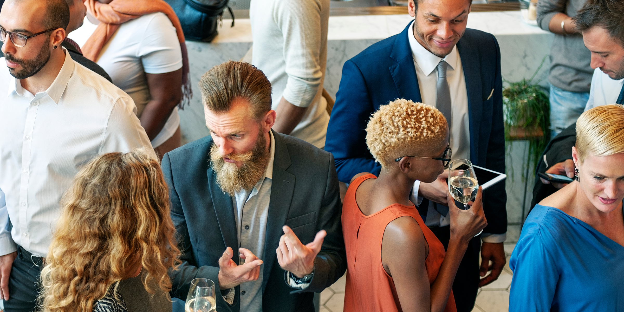People at a corporate party | Source: Shutterstock