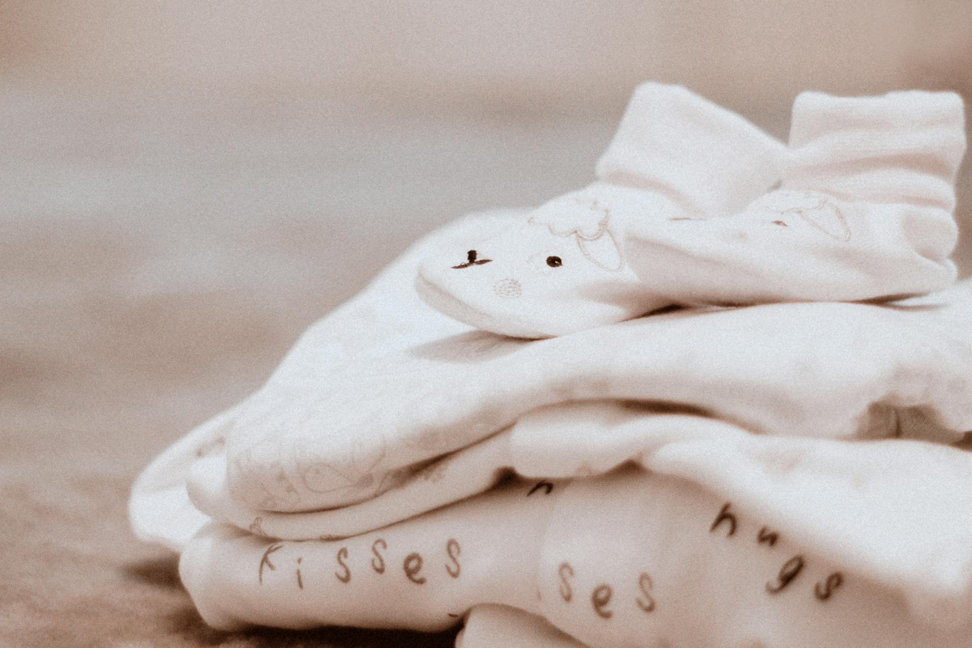 Folded baby clothes | Source: Pexels