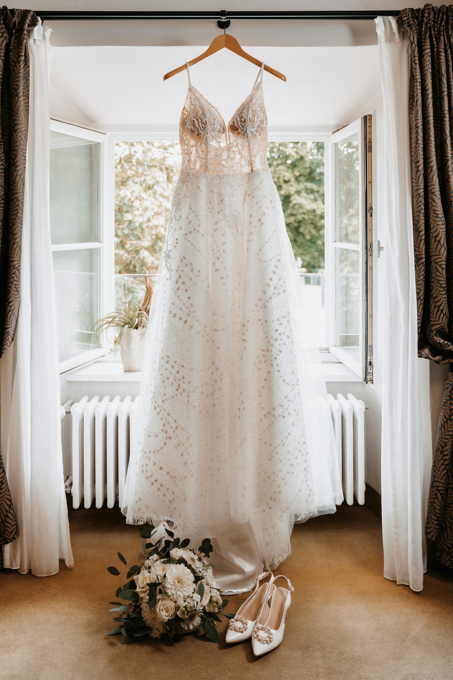 A bride's dress and shoes | Source: Pexels