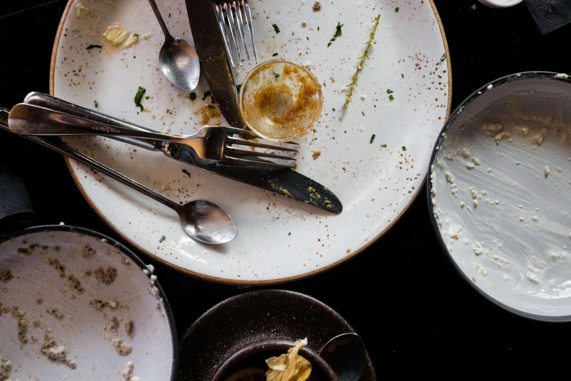 Dirty dishes on a table | Source: Unsplash