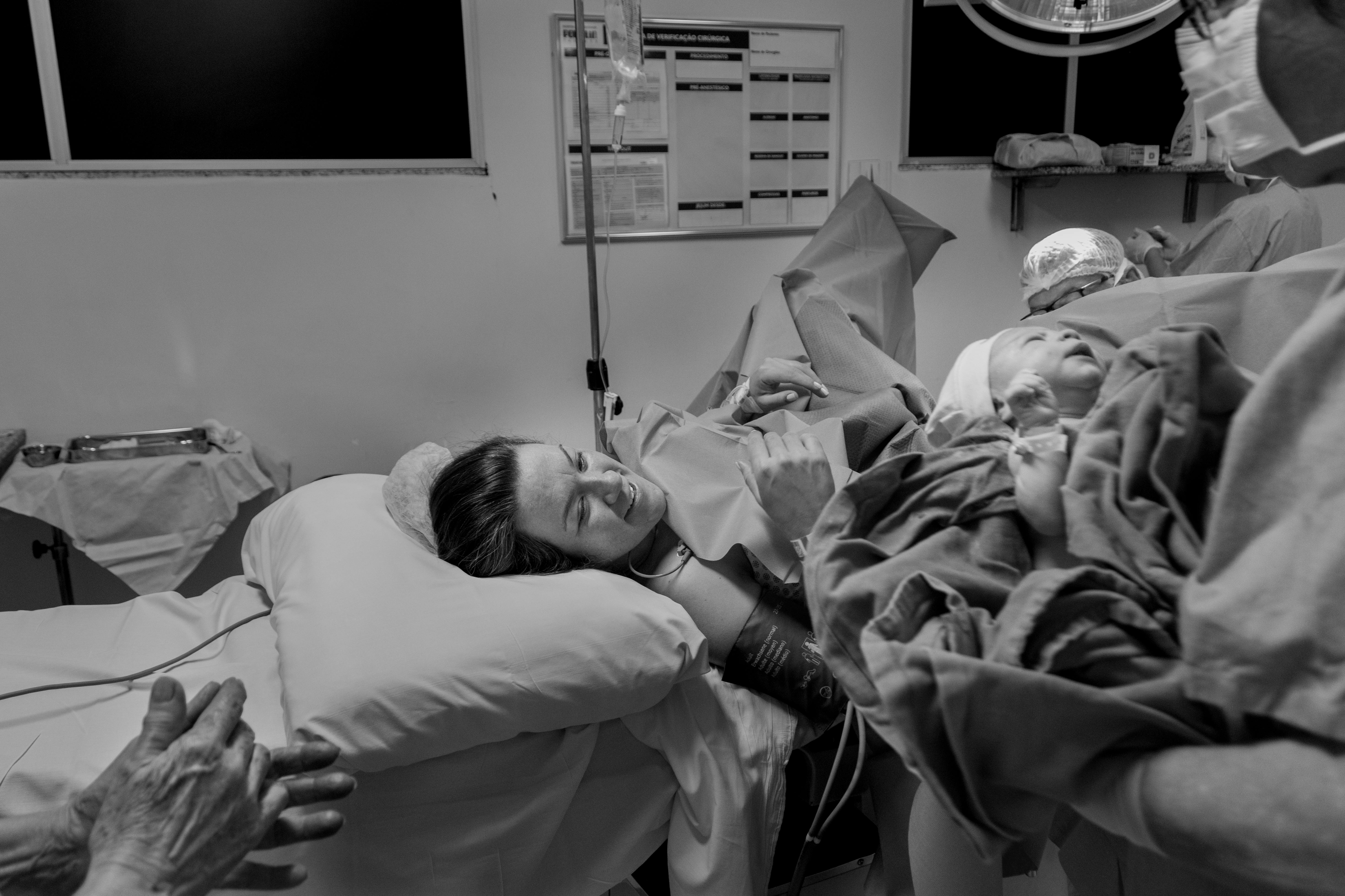 A newborn baby boy and his mom | Source: Pexels