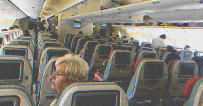 The inside of a plane full of passengers | Source: Shutterstock