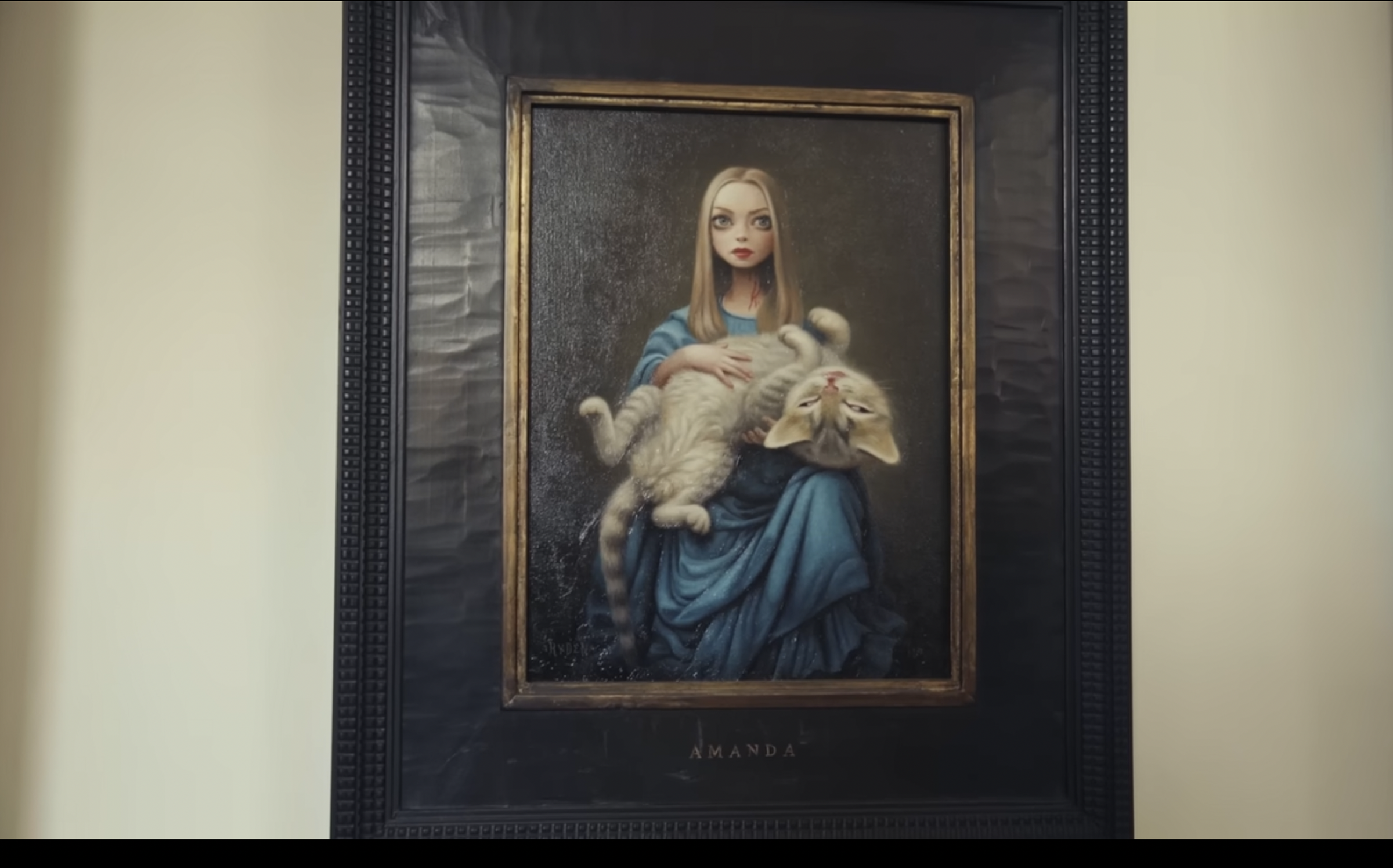 A painting of Amanda Seyfried by Mark Ryden in her New York apartment | Source: youtube/architecturaldigest