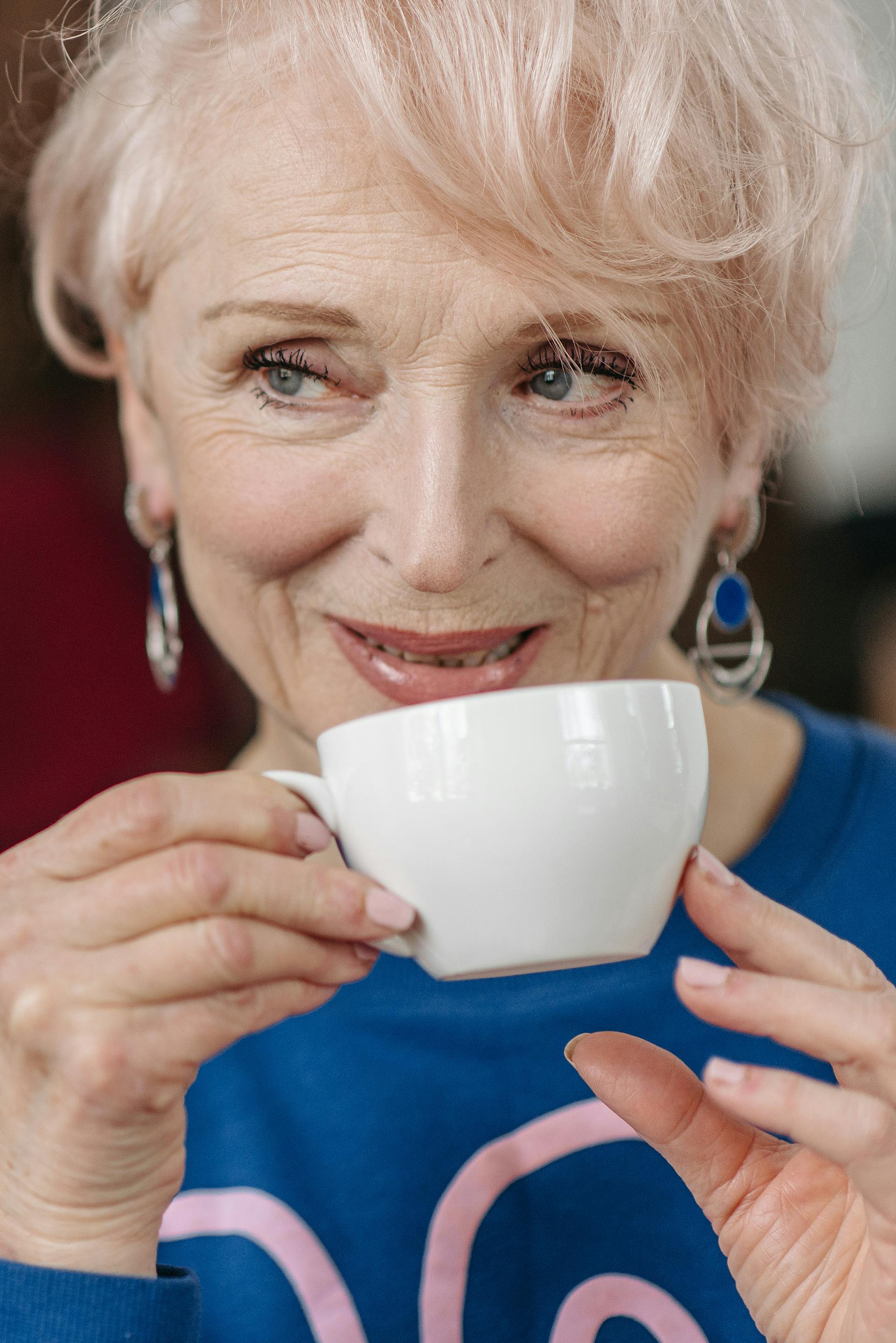 A senior woman drinking coffee | Source: Pexels