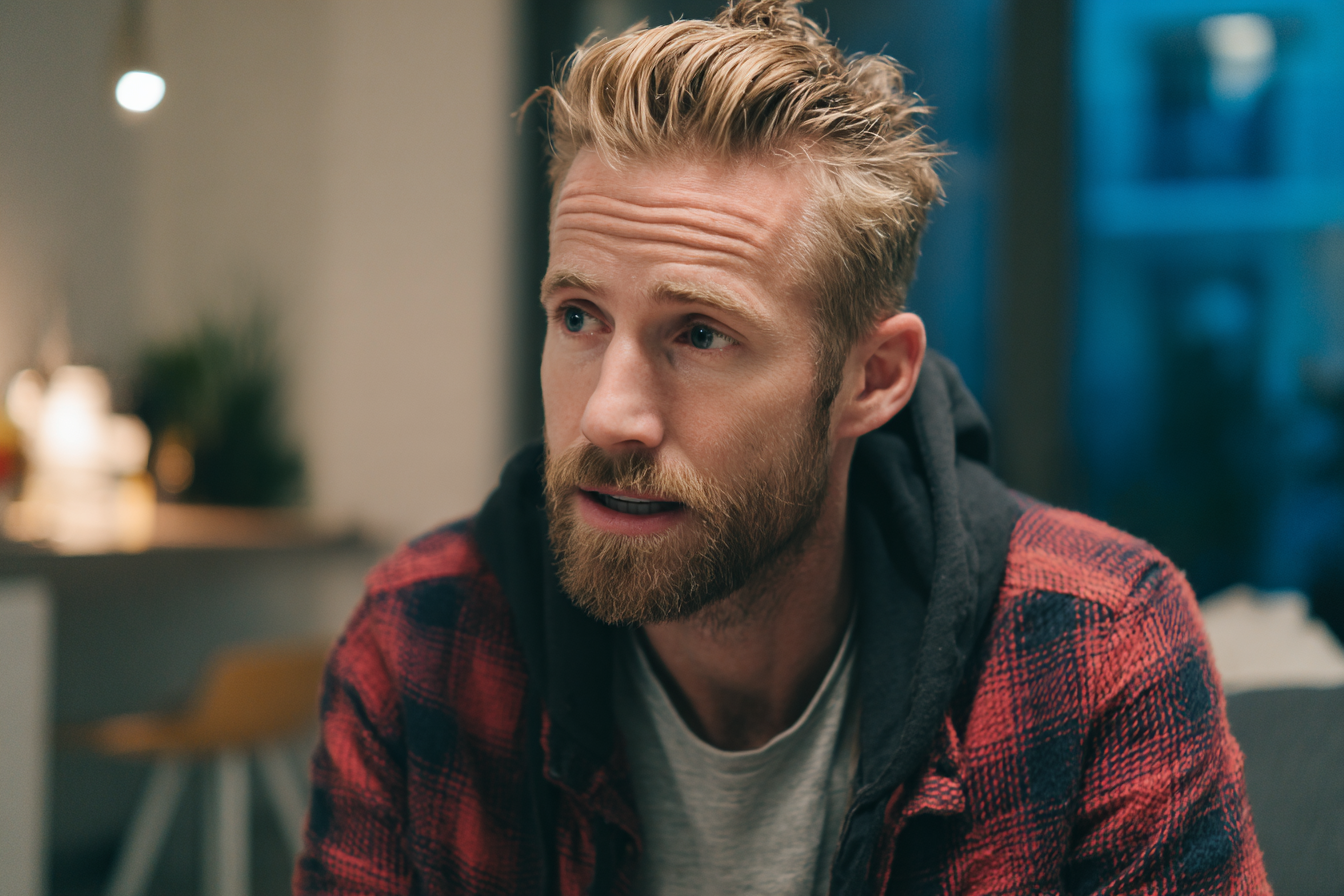 A man in his friend's apartment | Source: Midjourney