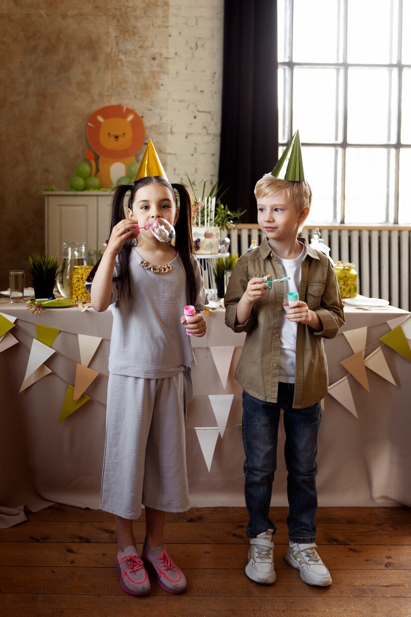 Happy kids at a party | Source: Freepik