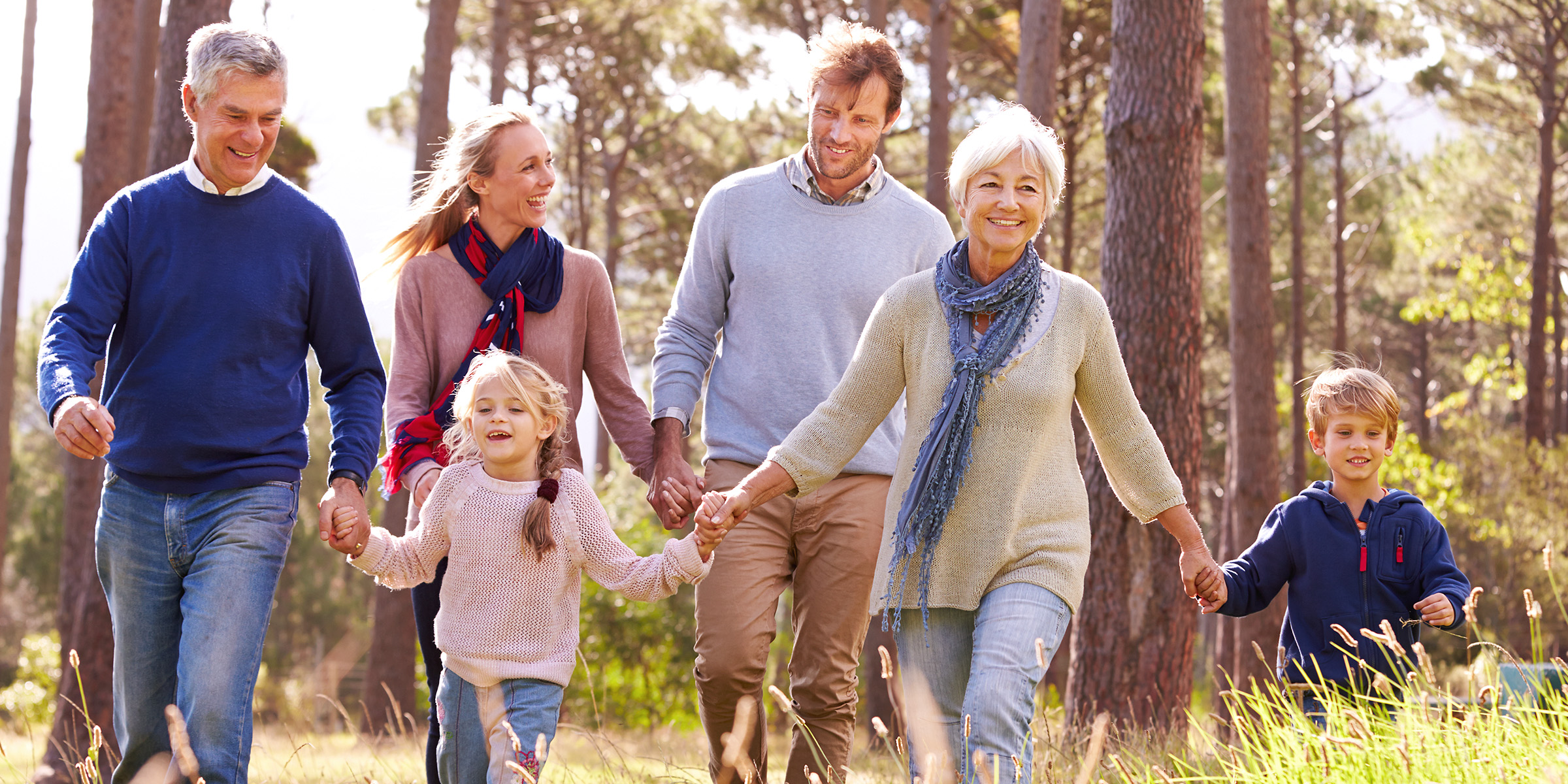 A family walking outdoors | Source: Shutterstock