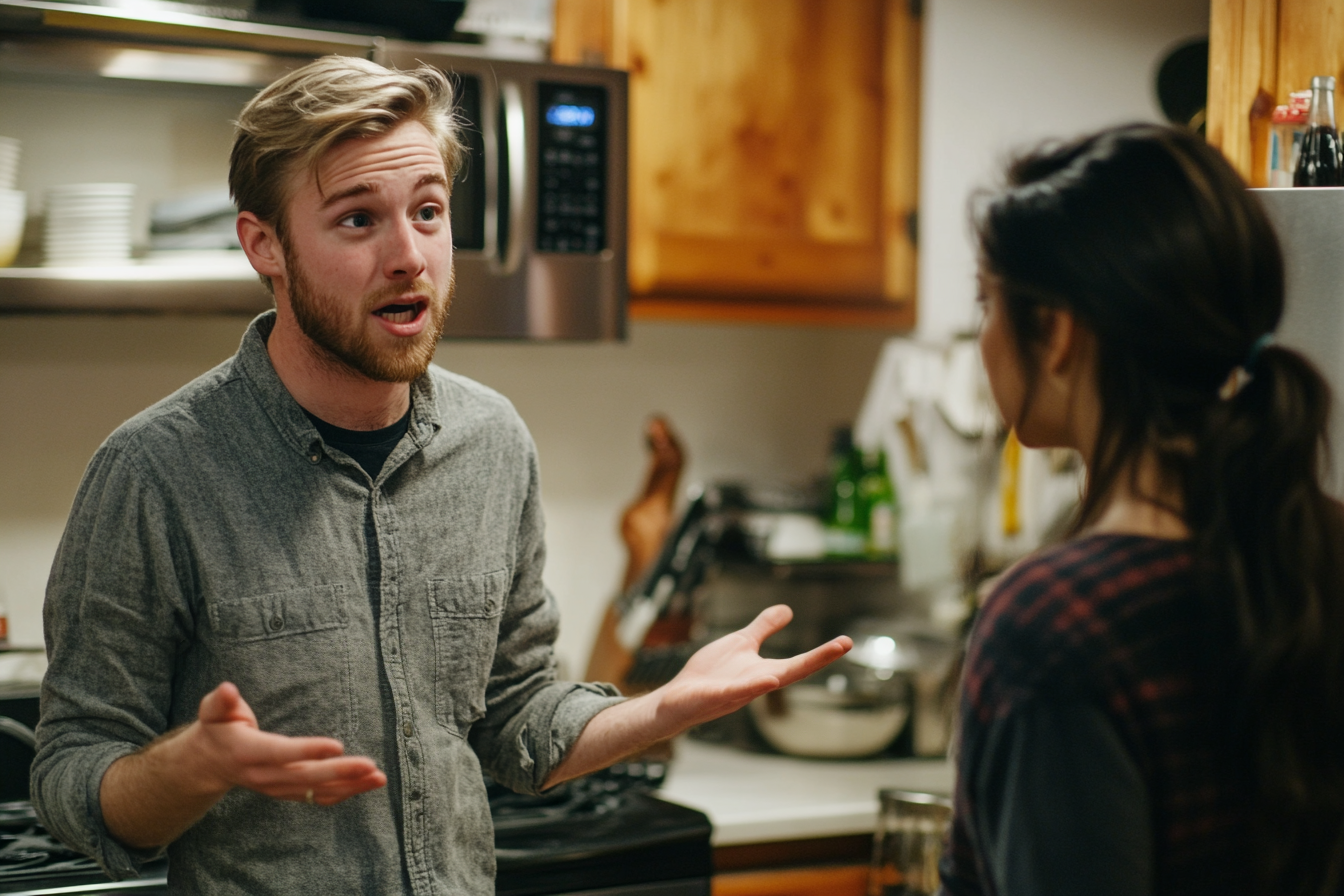 A couple speaking in a kitchen | Source: Midjourney