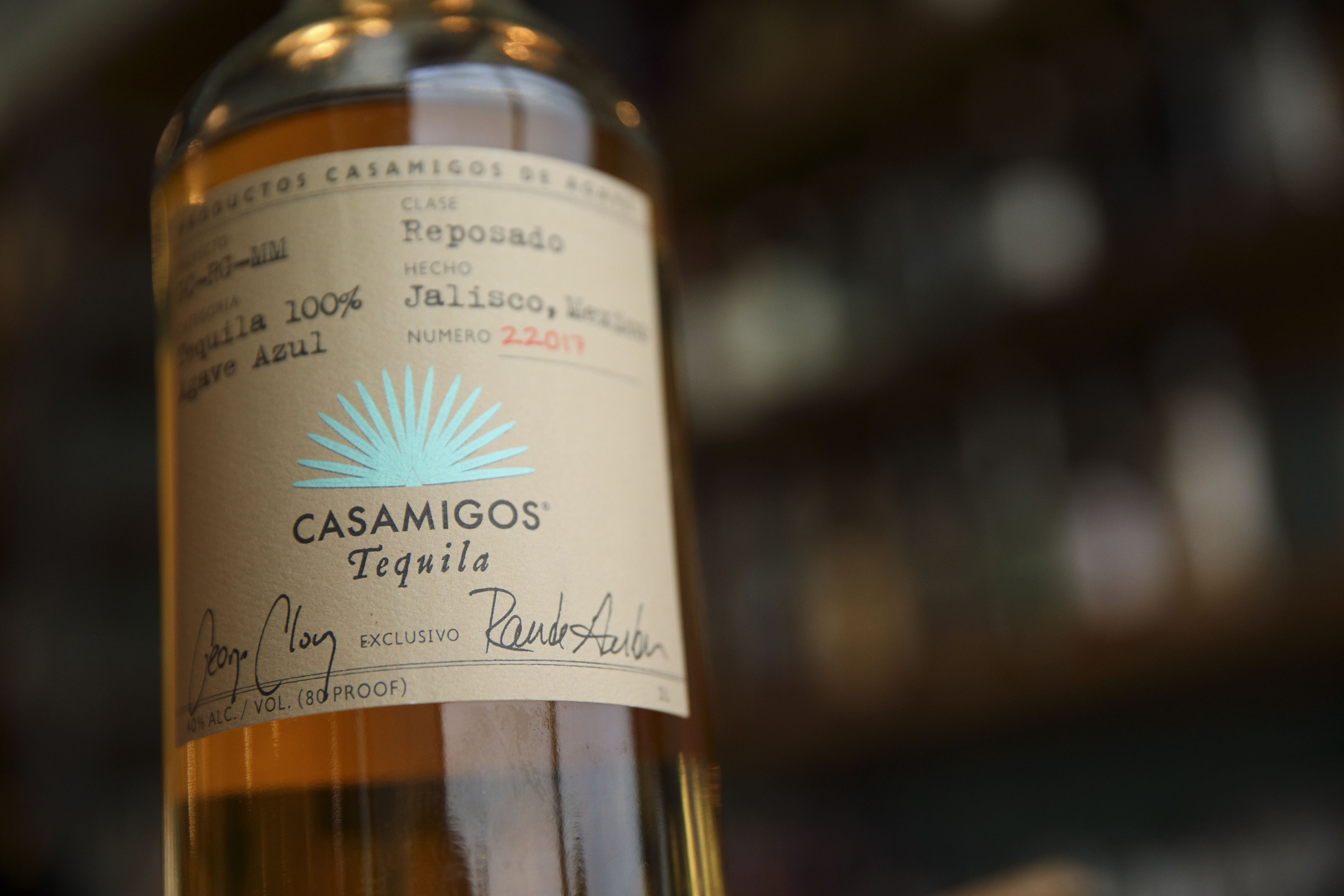 A bottle of Casamigos reposado tequila is arranged for a photograph at a restaurant in Los Angeles, California, U.S., on Thursday, June 22, 2017. | Source: Getty Images