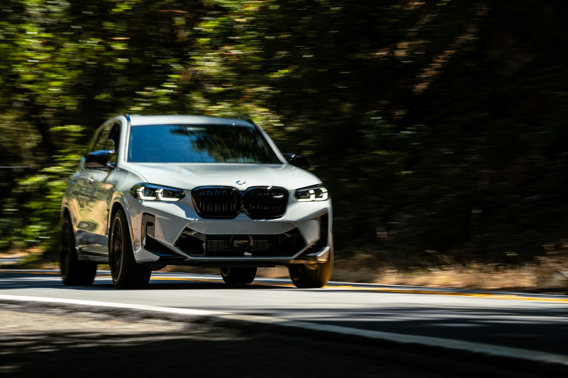 A car speeding down a road | Source: Unsplash
