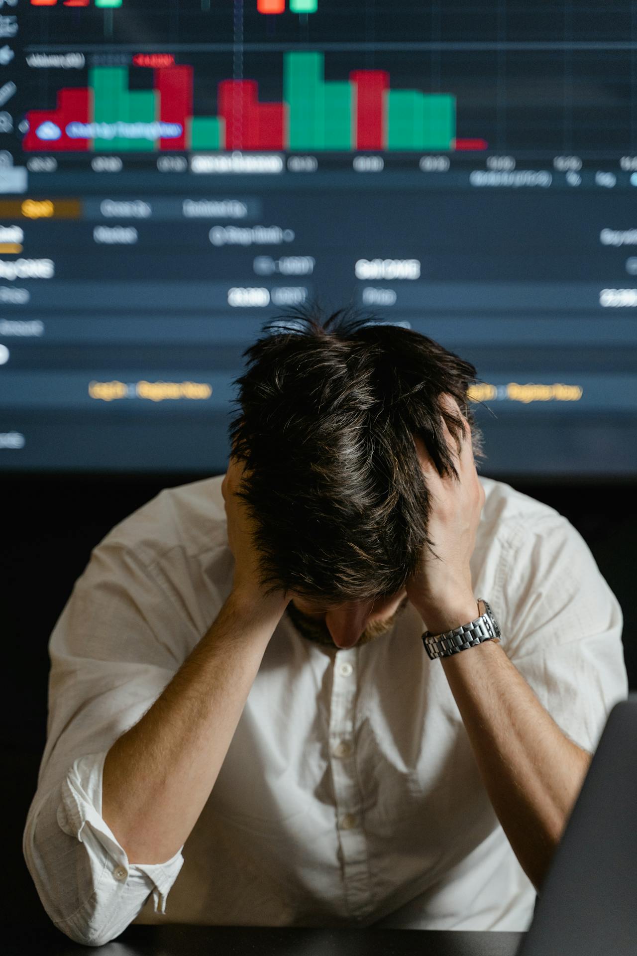 A stressed man in his office | Source: Pexels