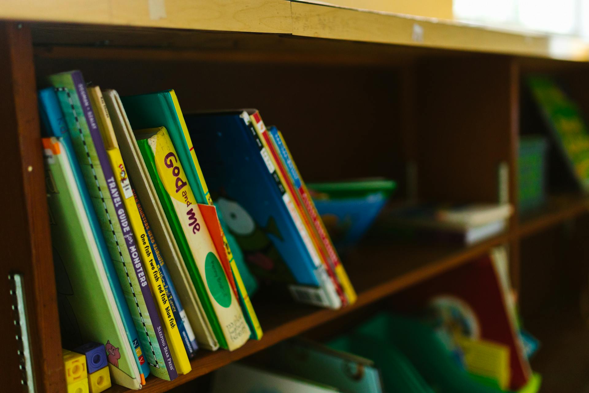 Children's books on a bookshelf | Source: Pexels