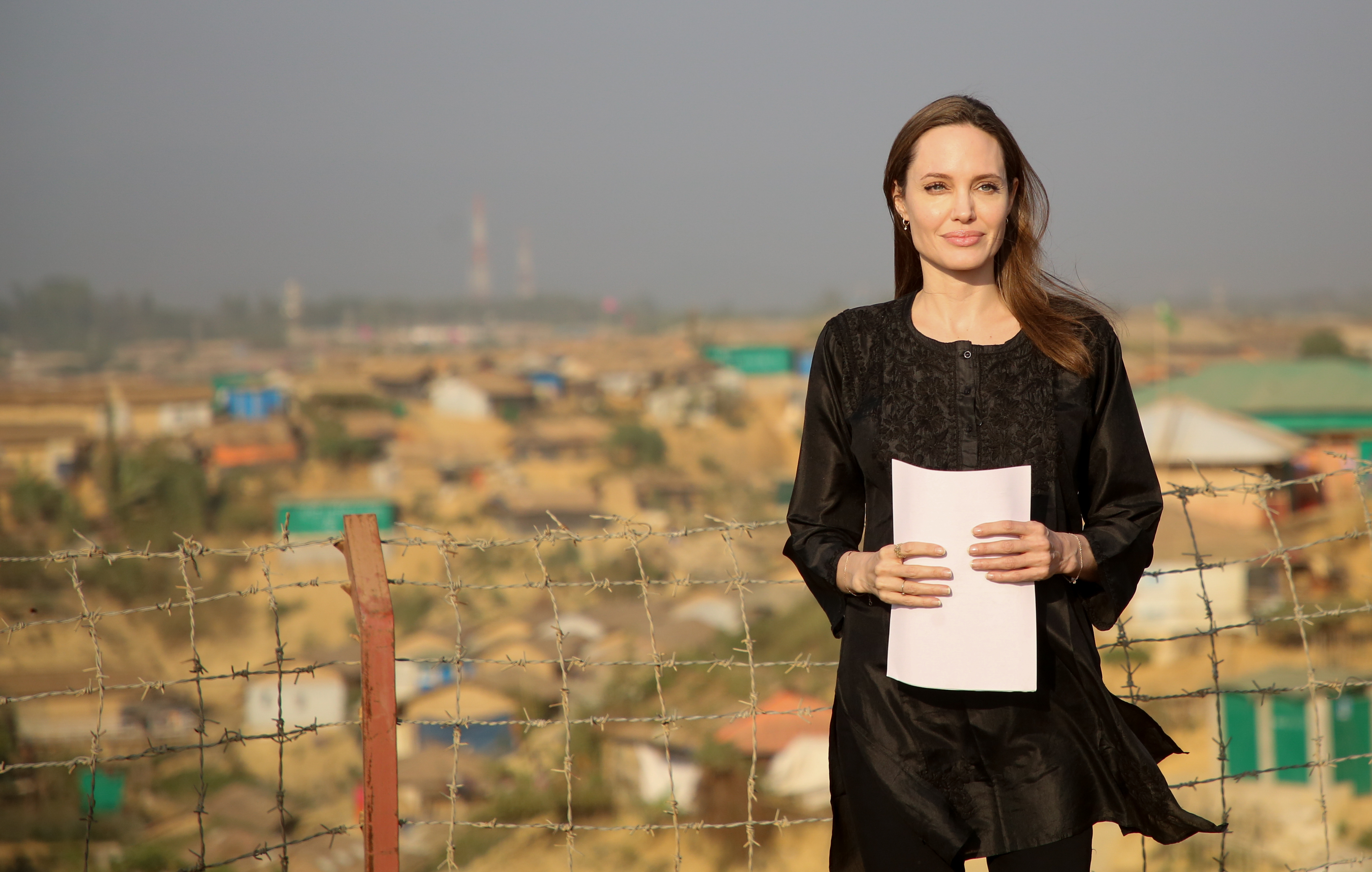 Angelina Jolie, a special envoy for the United Nations High Commissioner for Refugees (UNHCR), addresses a press conference after her visit to the Kutupalong camp for Rohingya refugees in Ukhia in southern Bangladesh on February 5, 2019. | Source: Getty Images