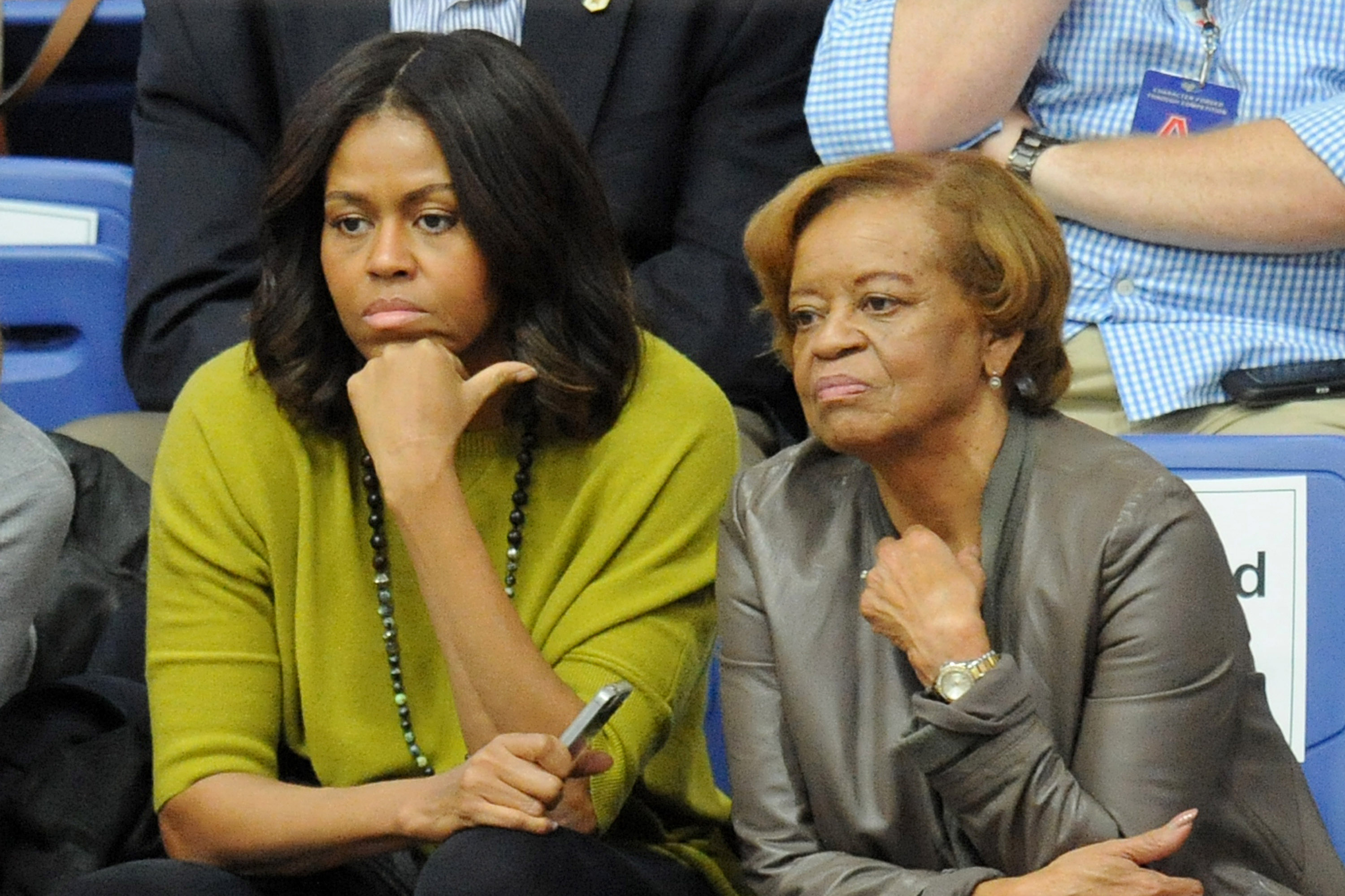 Michelle Obama and Marian Robinson watch a women's college basketball game between the Princeton Tigers and the American University Eagles at Bender Arena on November 23, 2014, in Washington, DC. | Source: Getty Images