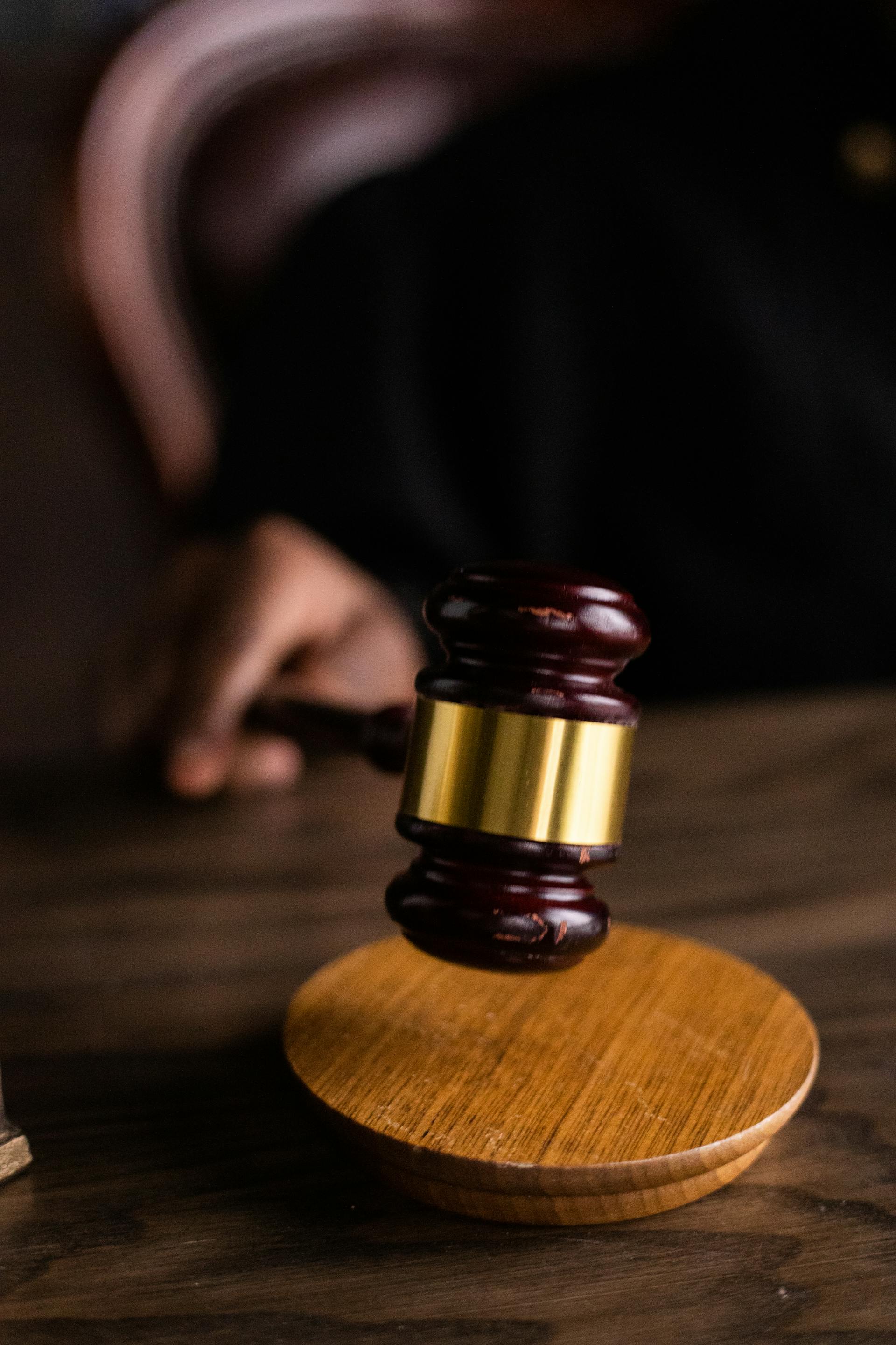 A close-up shot of a judge holding a gavel | Source: Pexels