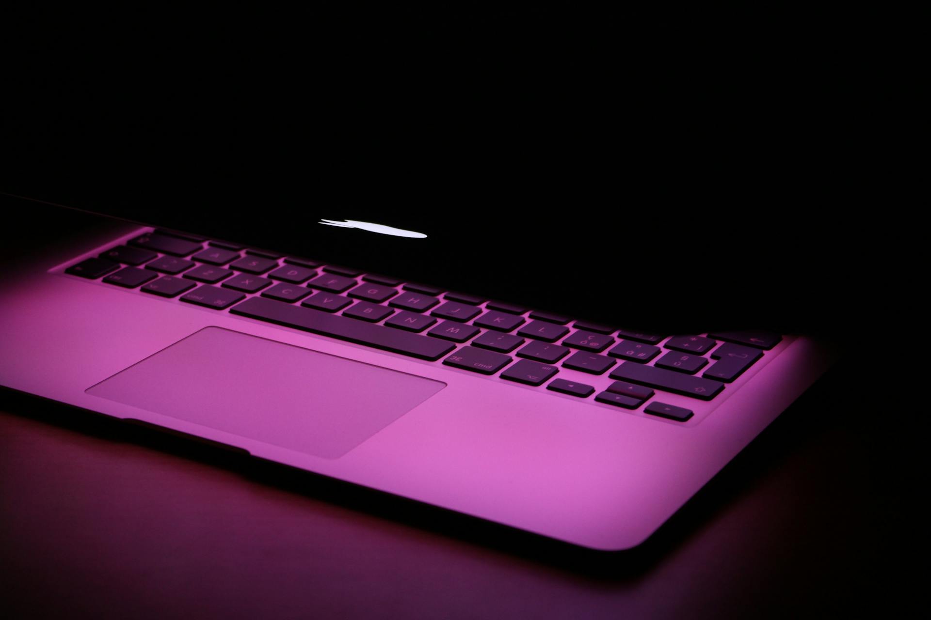 A half-open laptop | Source: Pexels