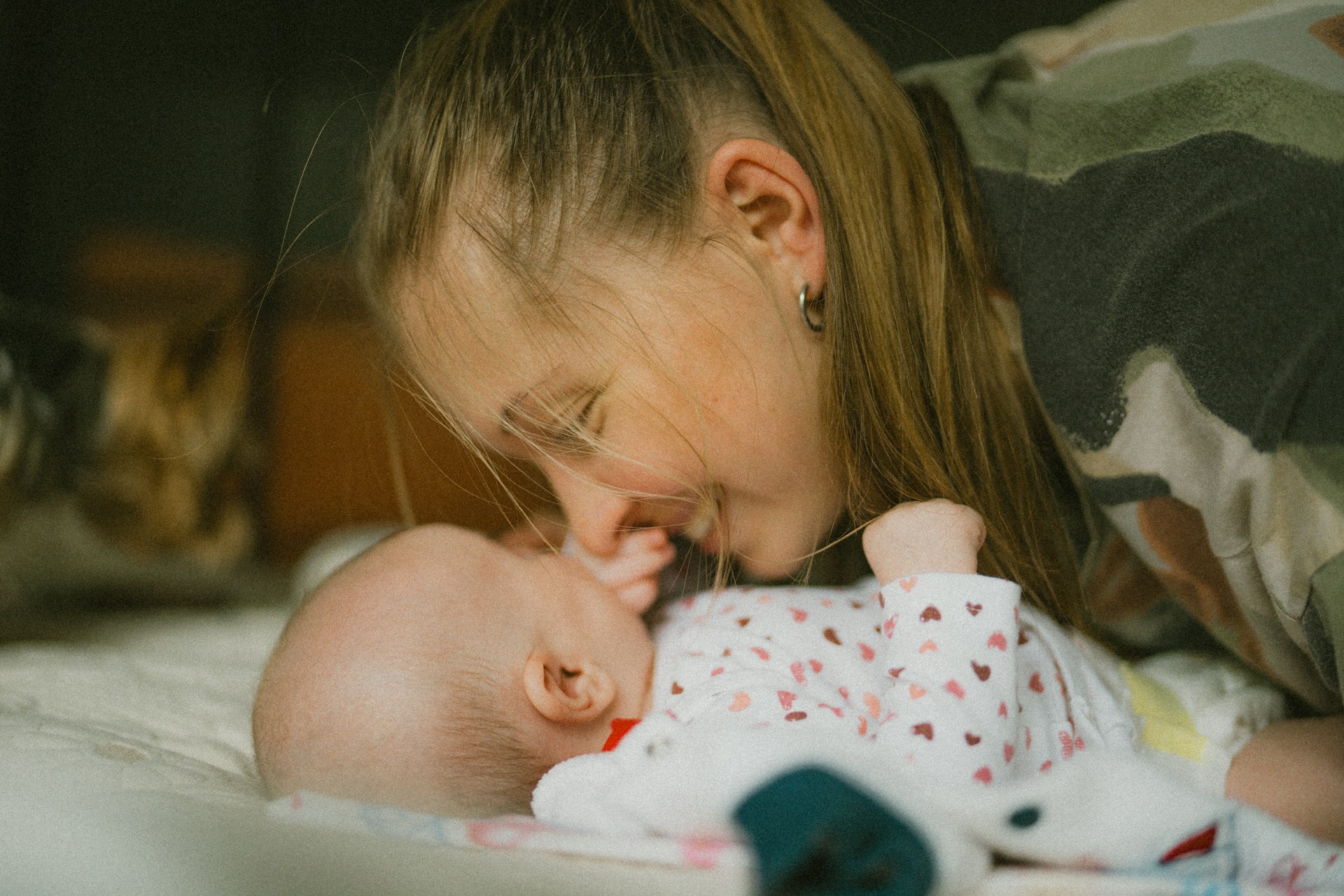A mother with her newborn baby | Source: Unsplash