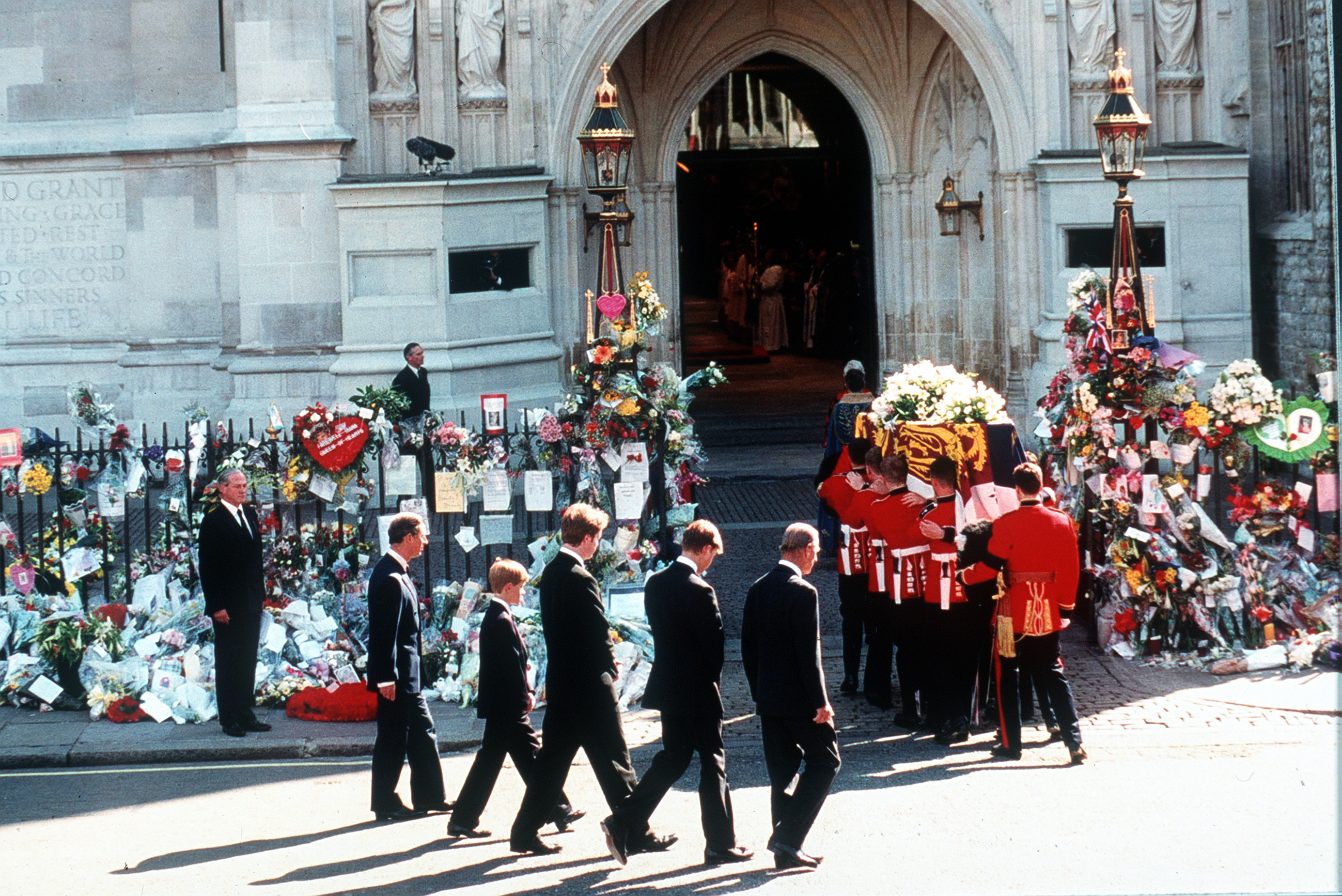 Earl Spencer, Prince William, Prince Harry, Prince Charles and the Duke of Edinburgh follow the coffin to the funeral cortege of Diana, Princess of Wales as it arrives at Westminster Abbey on September 6, 1997 in London, England. | Source: Getty Images