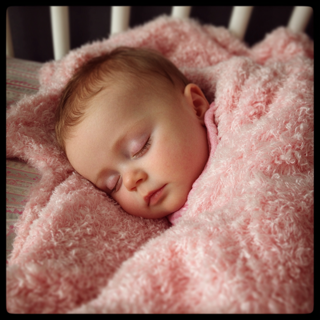 A sleeping baby girl | Source: Midjourney