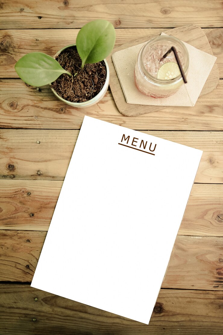 A menu on a table | Source: Freepik