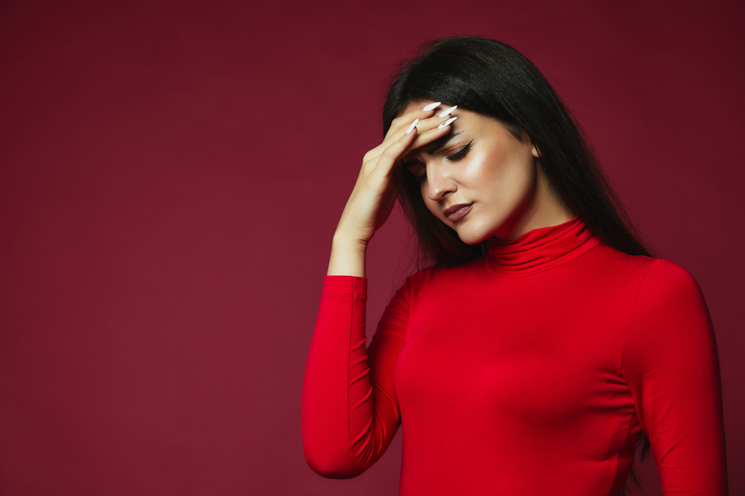 A disheartened woman | Source: Freepik
