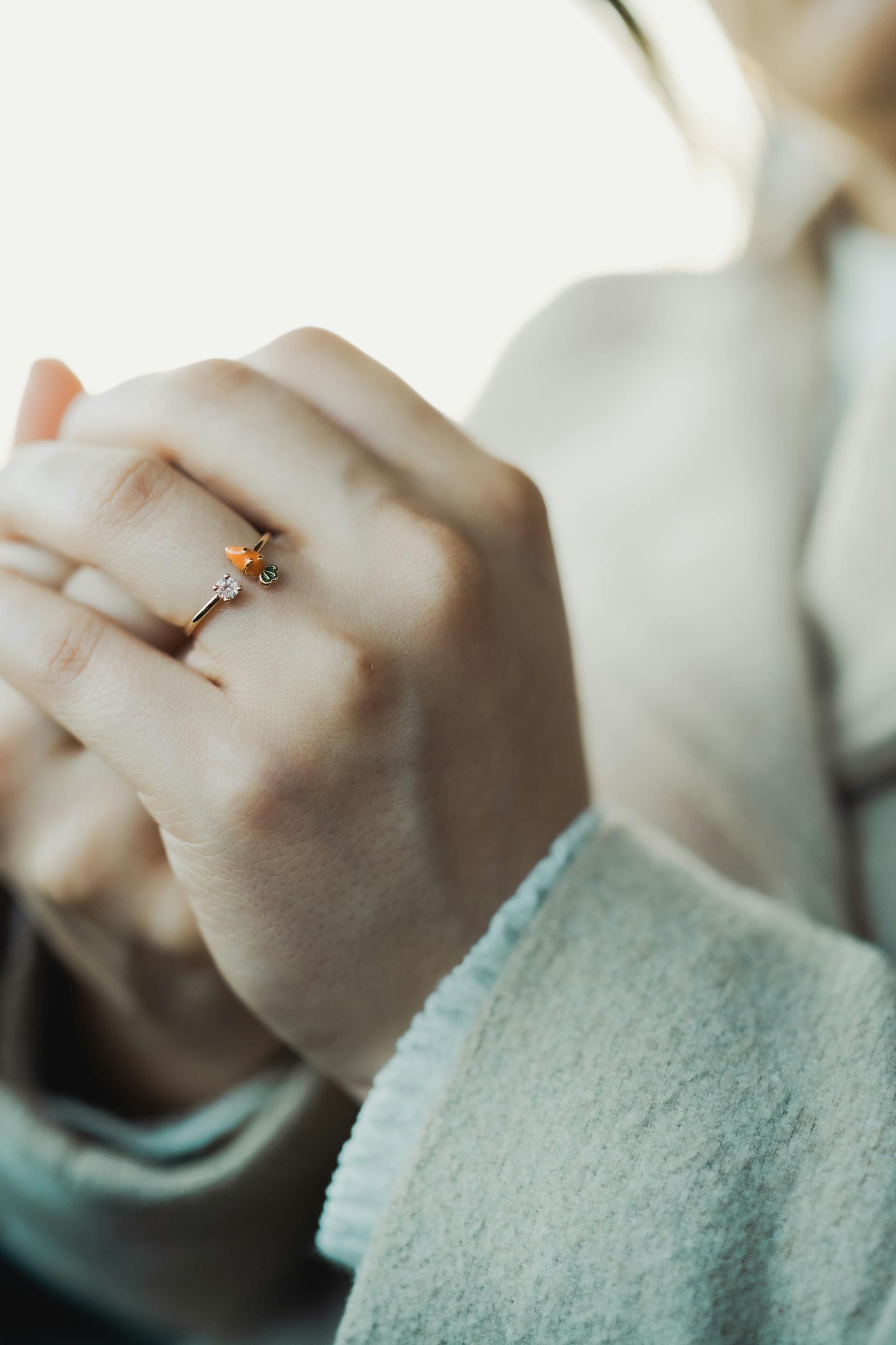 A woman's hands clasped together | Source: Pexels