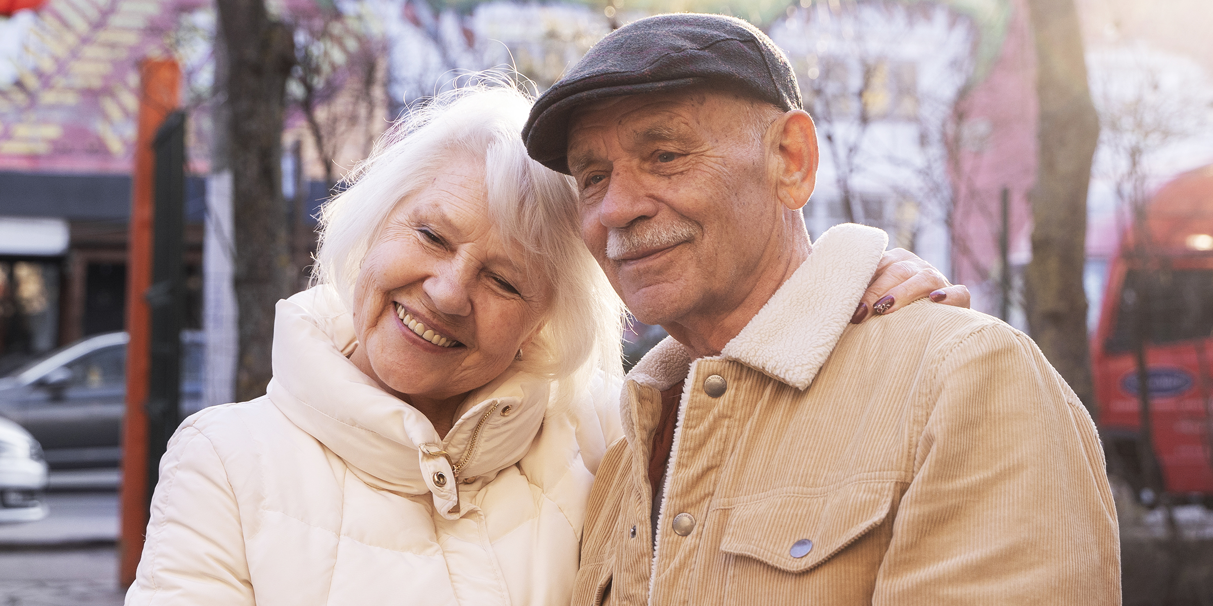 An elderly couple smiling warmly | Source: Freepik