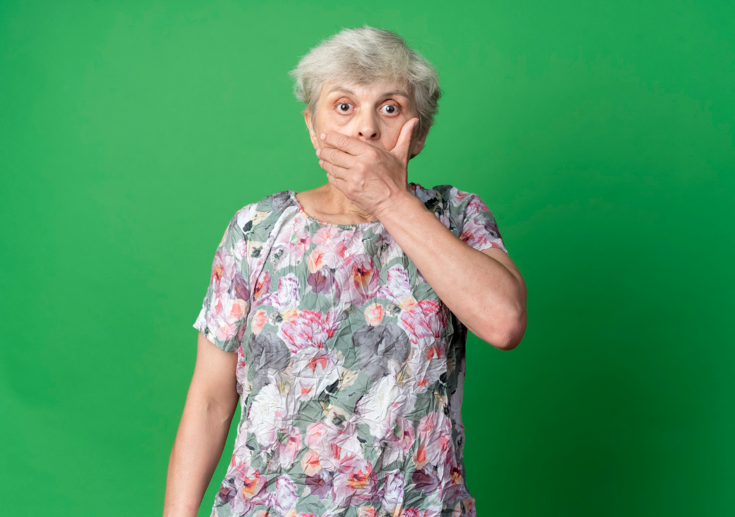 A shocked senior woman | Source: Freepik