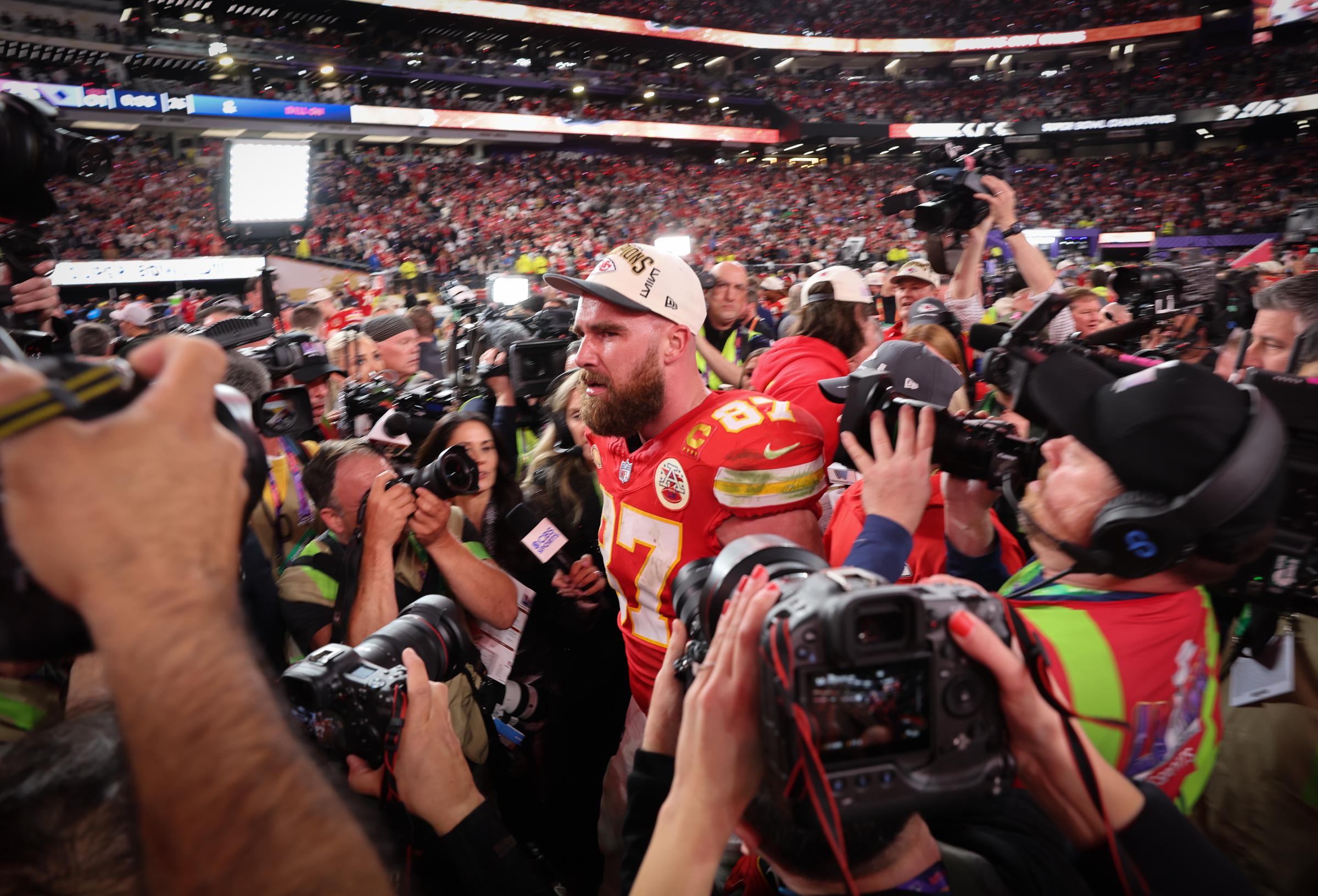 Travis Kelce is swarmed by press after defeating the San Francisco 49ers at Super Bowl LVIII on Sunday, February 11, 2024, at Allegiant Stadium in Las Vegas, Nevada. | Source: Getty Images