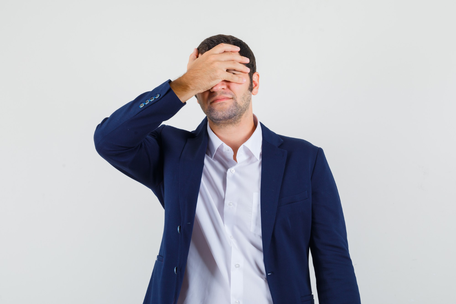 An overwhelmed man | Source: Freepik