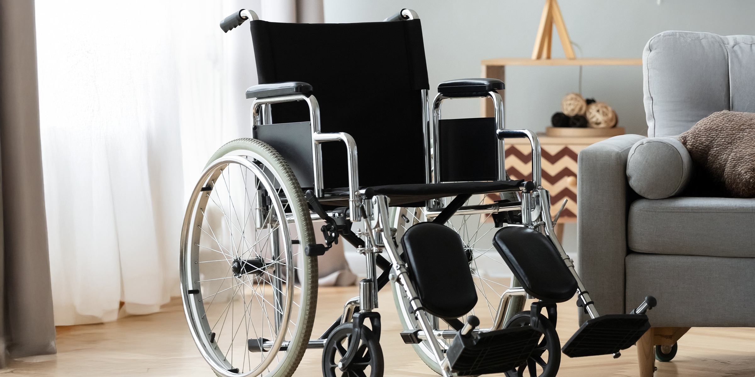 A wheelchair in a living room | Source: Shutterstock