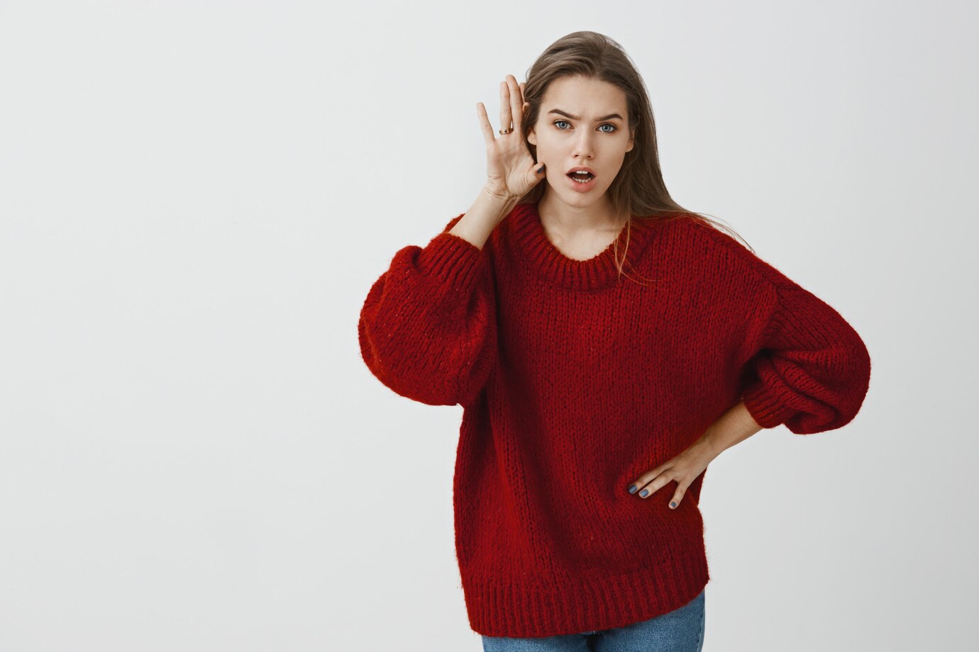 A woman eavesdropping | Source: Freepik