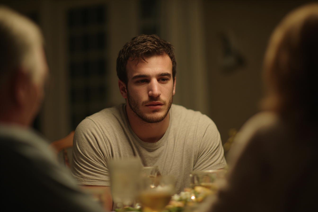 A man speaking at a family dinner | Source: Midjourney