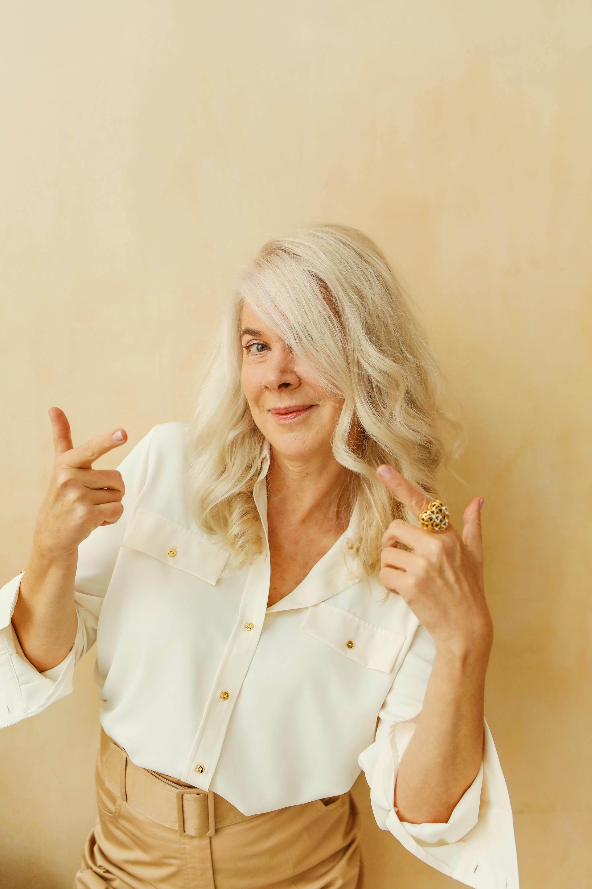 A woman smiling with pride | Source: Pexels