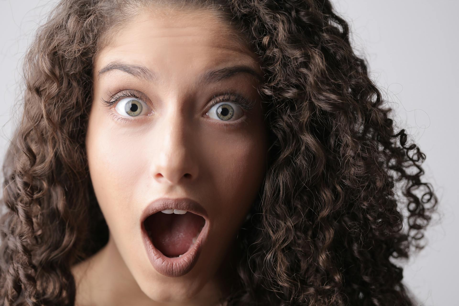 A woman gasping in shock | Source: Pexels