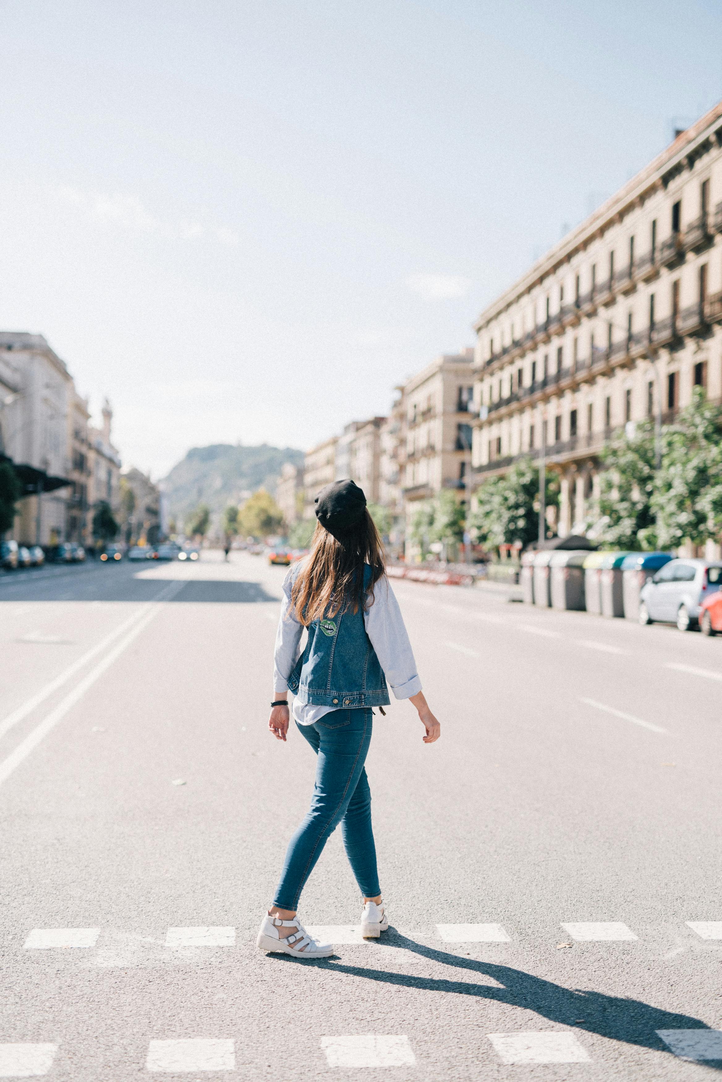 A woman walking away | Source: Pexels