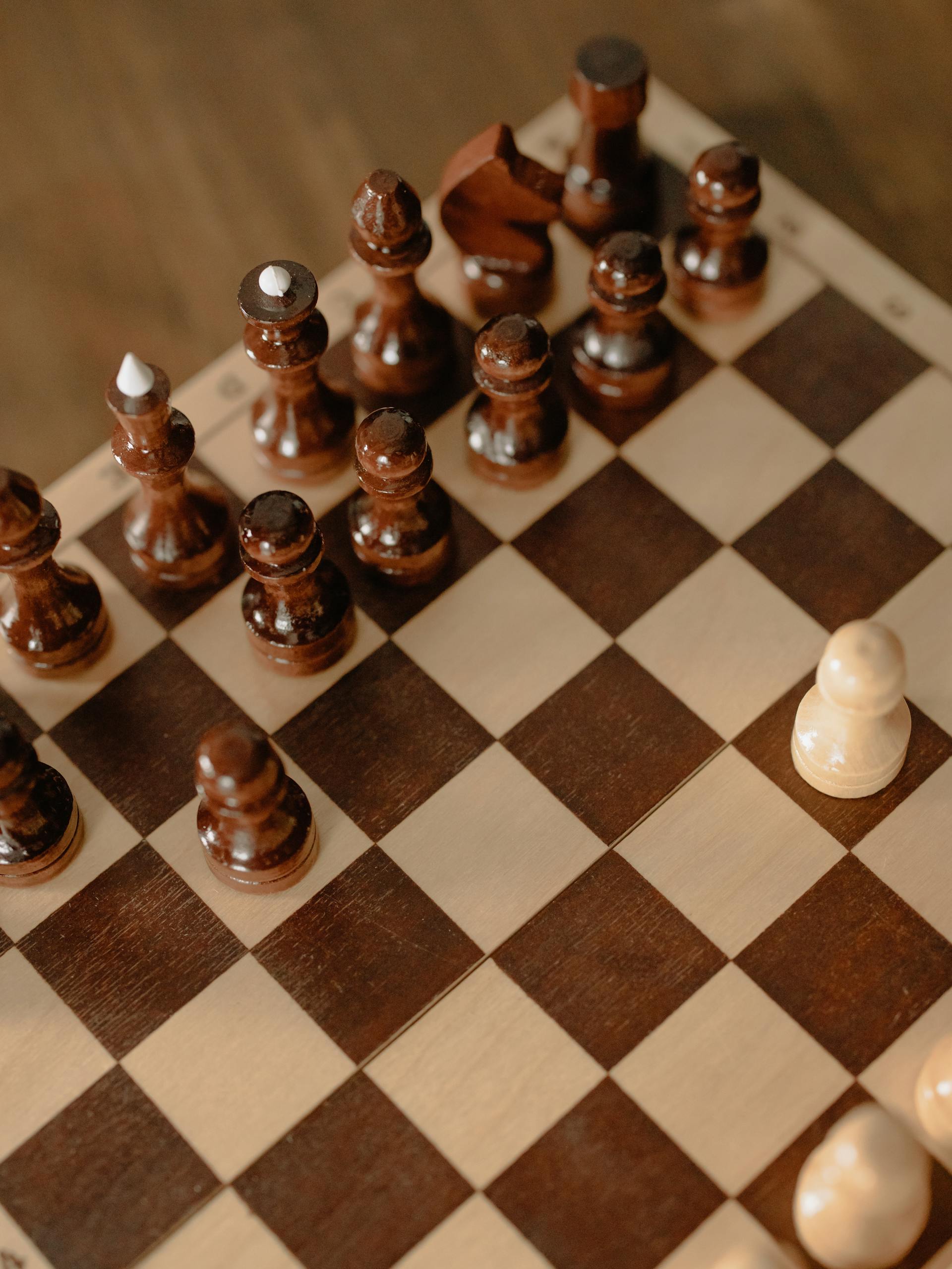 A photo showing chess pieces on a chess board | Source: Pexels