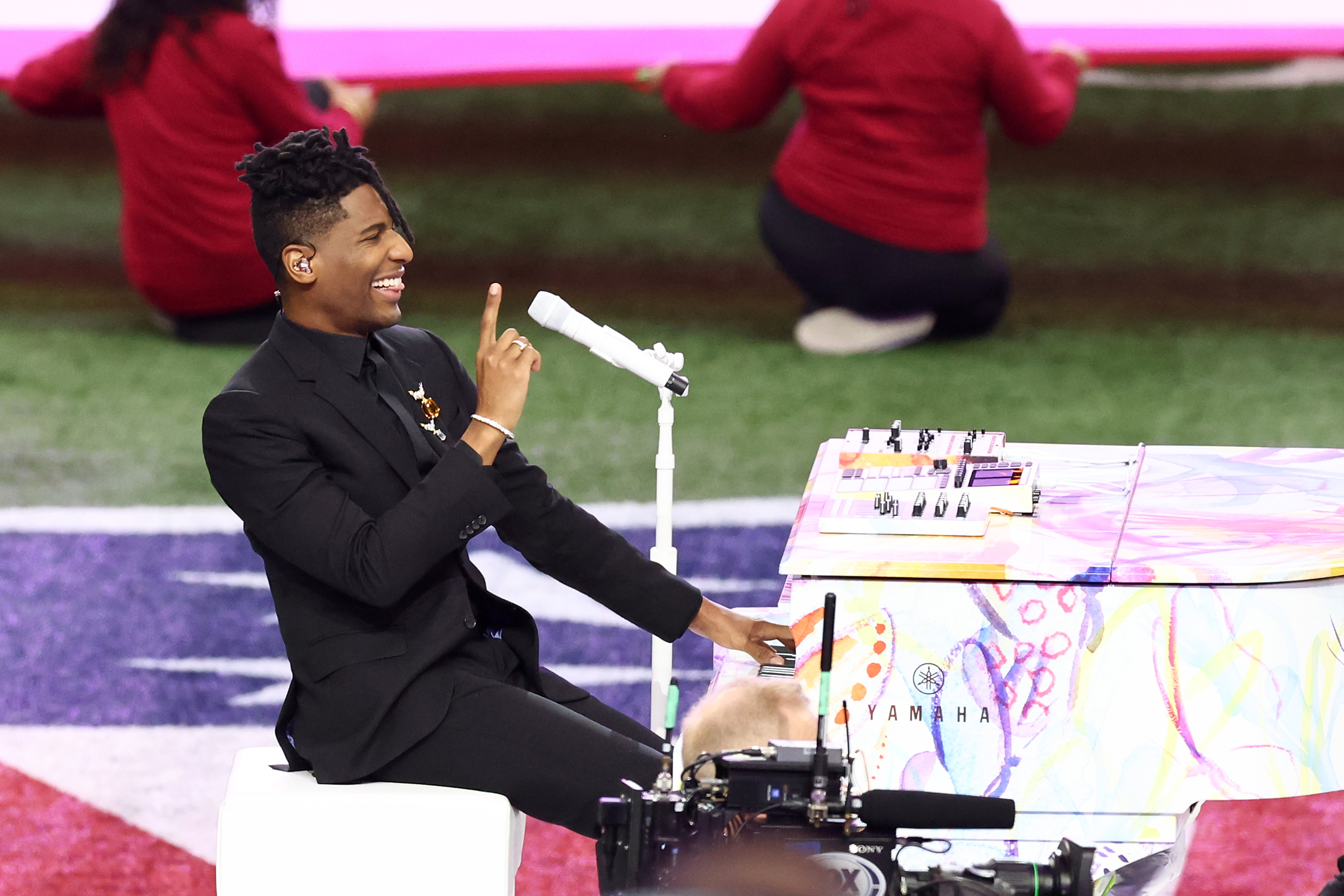 Jon Batiste performs the National Anthem onstage prior to Super Bowl LIX at Caesars Superdome in New Orleans, Louisiana, on February 9, 2025 | Source: Getty Images