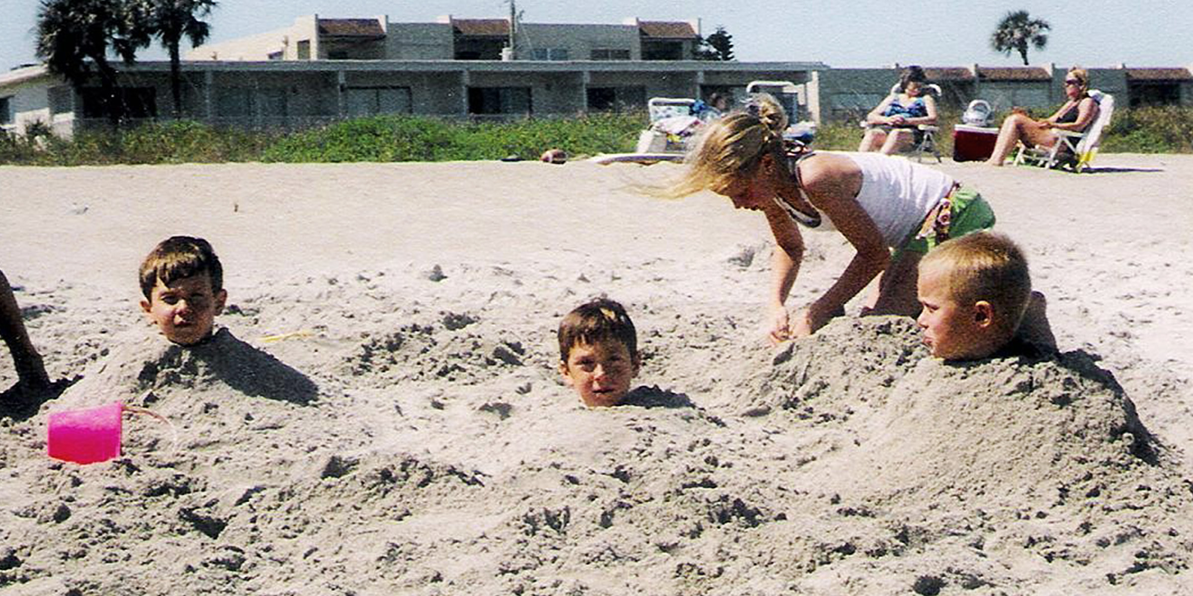 Three children at the beach | Source: Flickr