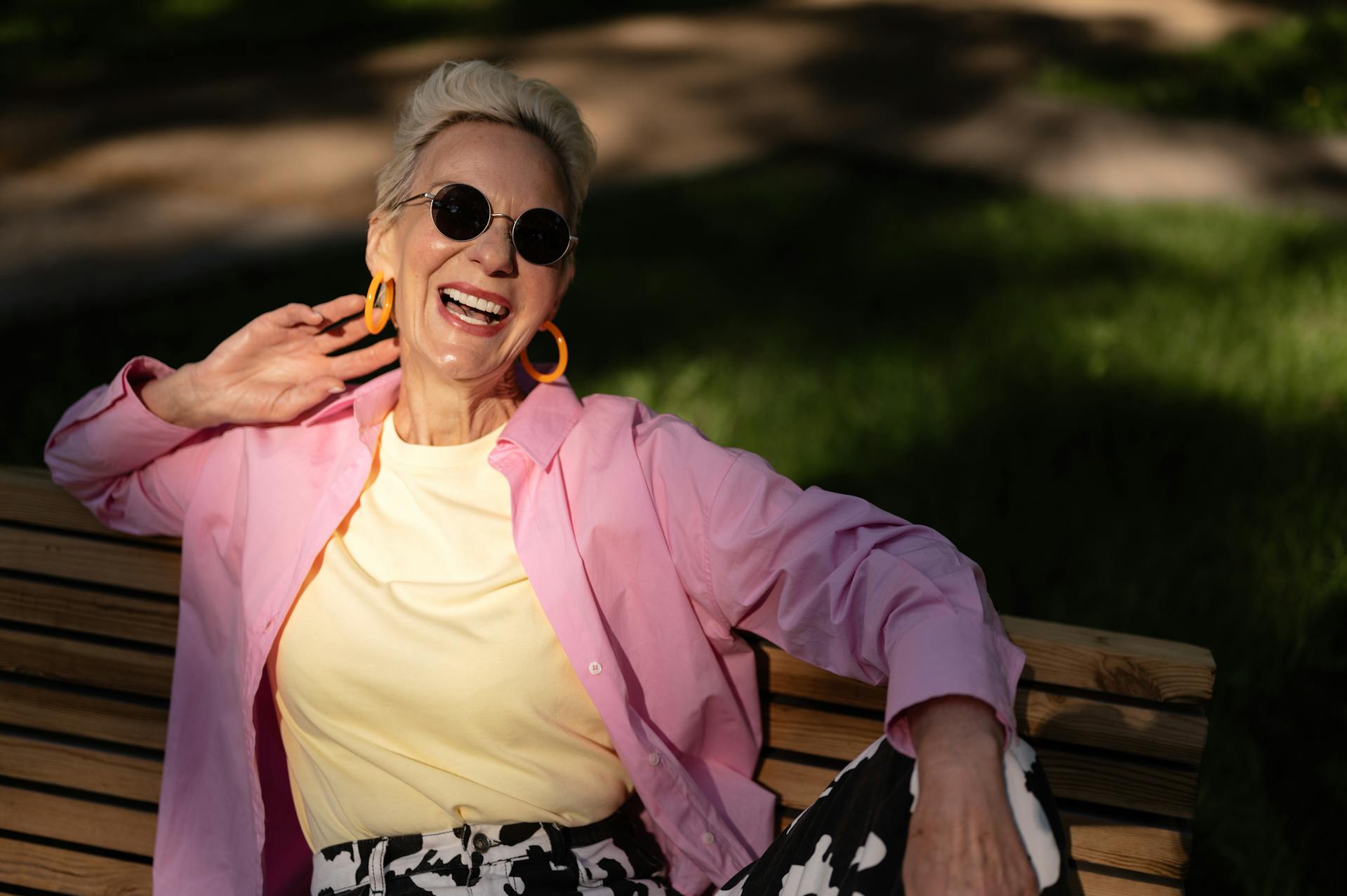 A senior woman laughing | Source: Pexels